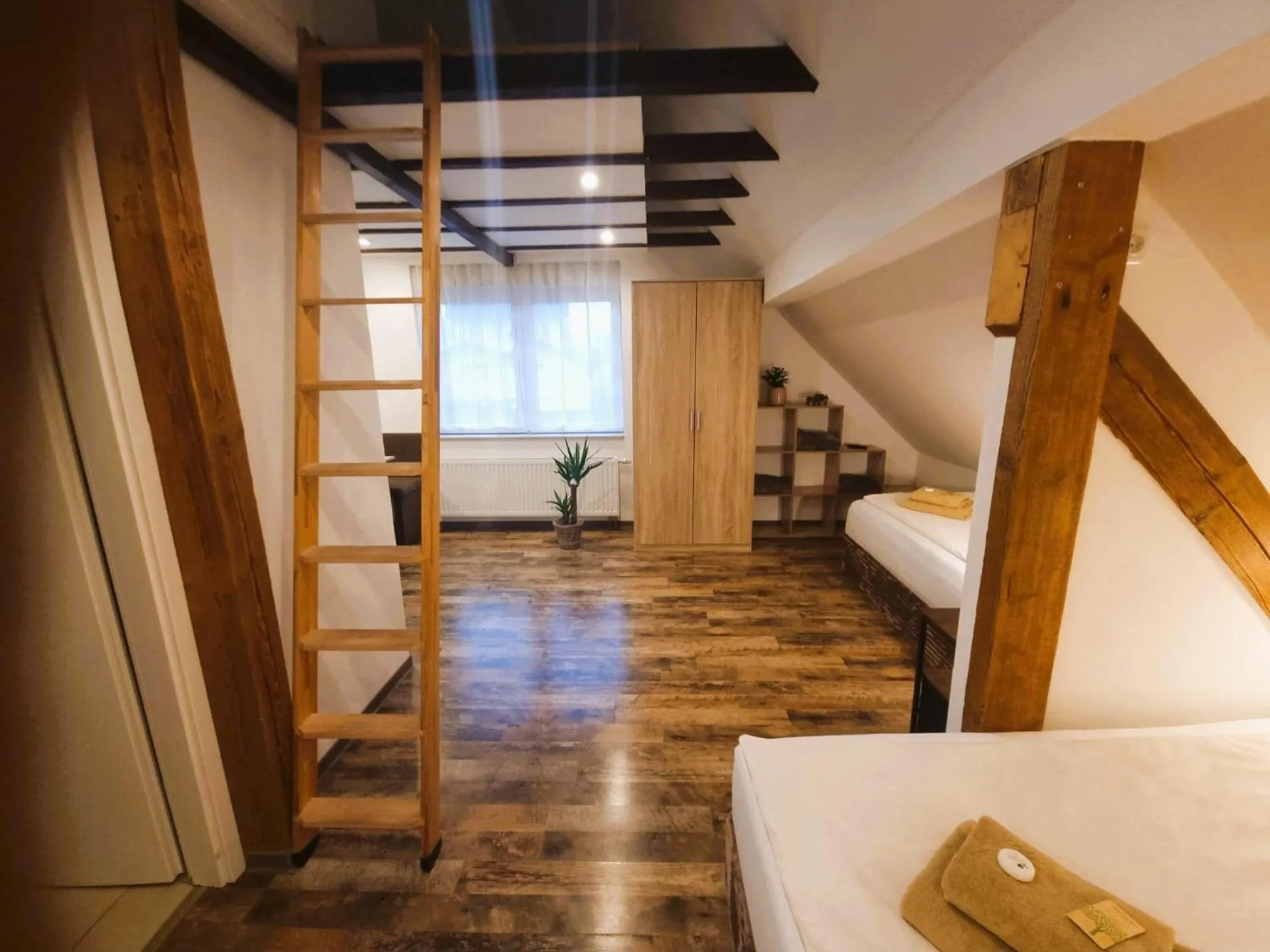 Photo of the whole room, Bed in CJS Apartments - Chill or Drive am Nürburgring, new Box Spring Beds, new furniture, WLan, Spacious Rooms, Quiet Location