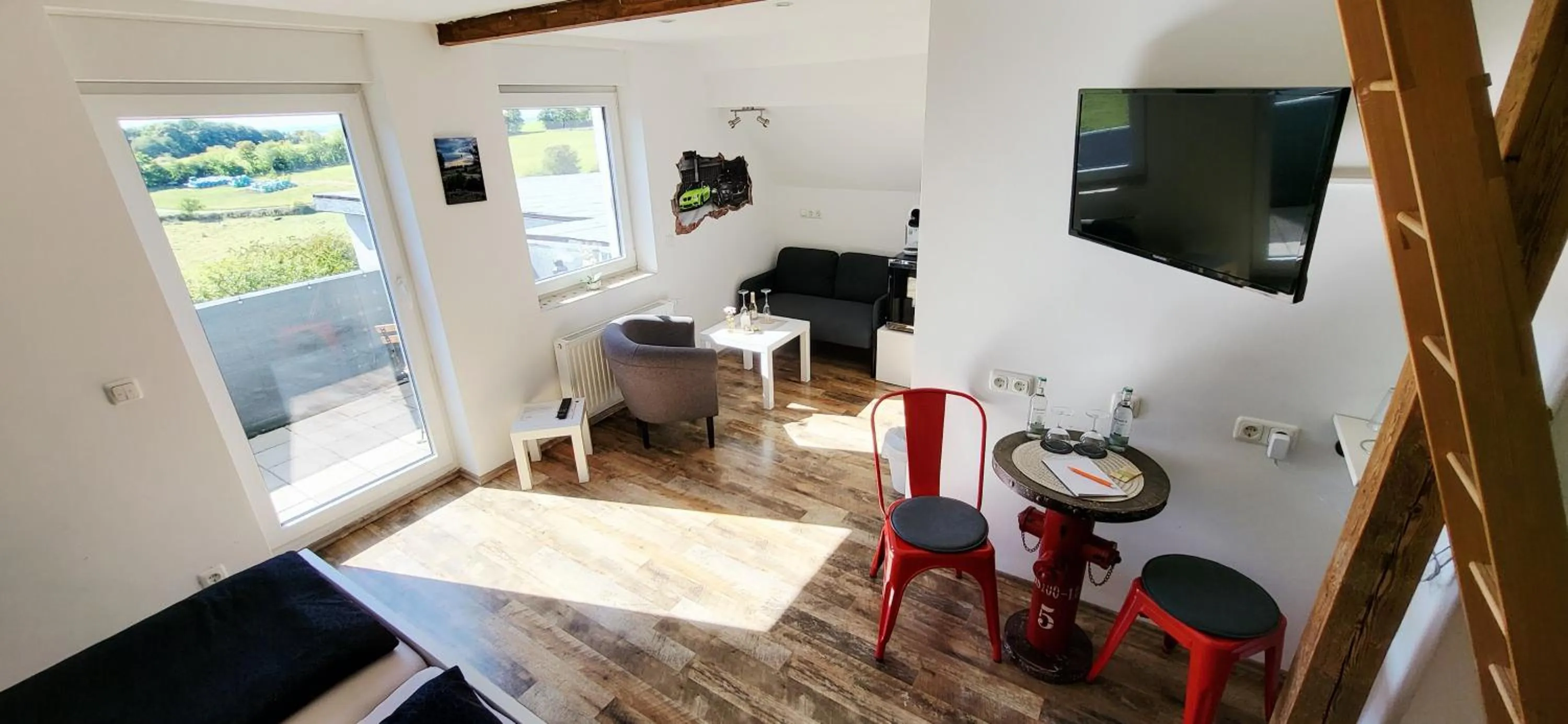 TV and multimedia in CJS Apartments - Chill or Drive am Nürburgring, Free Parking, WLan, Spacious Rooms, Quiet Location