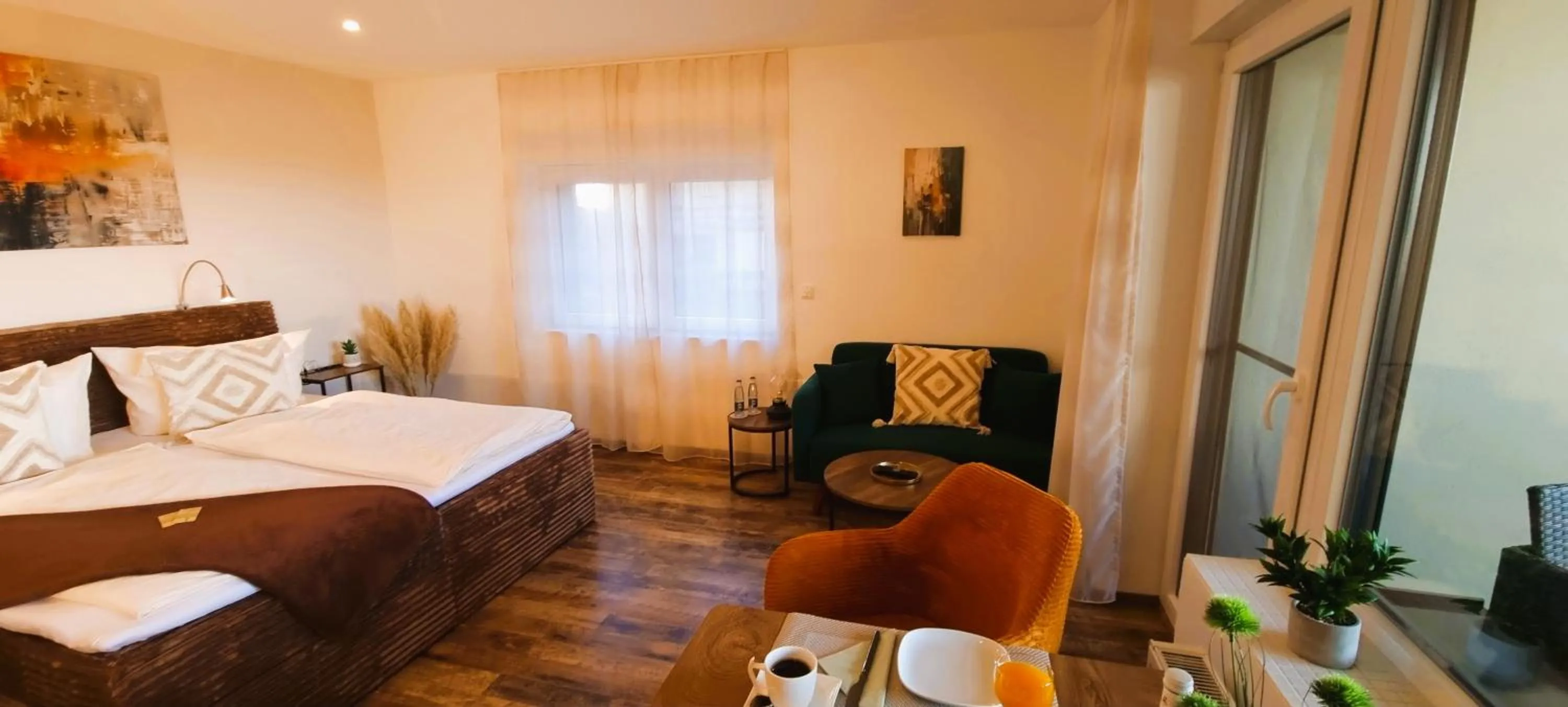 Living room, Bed in CJS Apartments - Chill or Drive am Nürburgring, new Box Spring Beds, new furniture, WLan, Spacious Rooms, Quiet Location