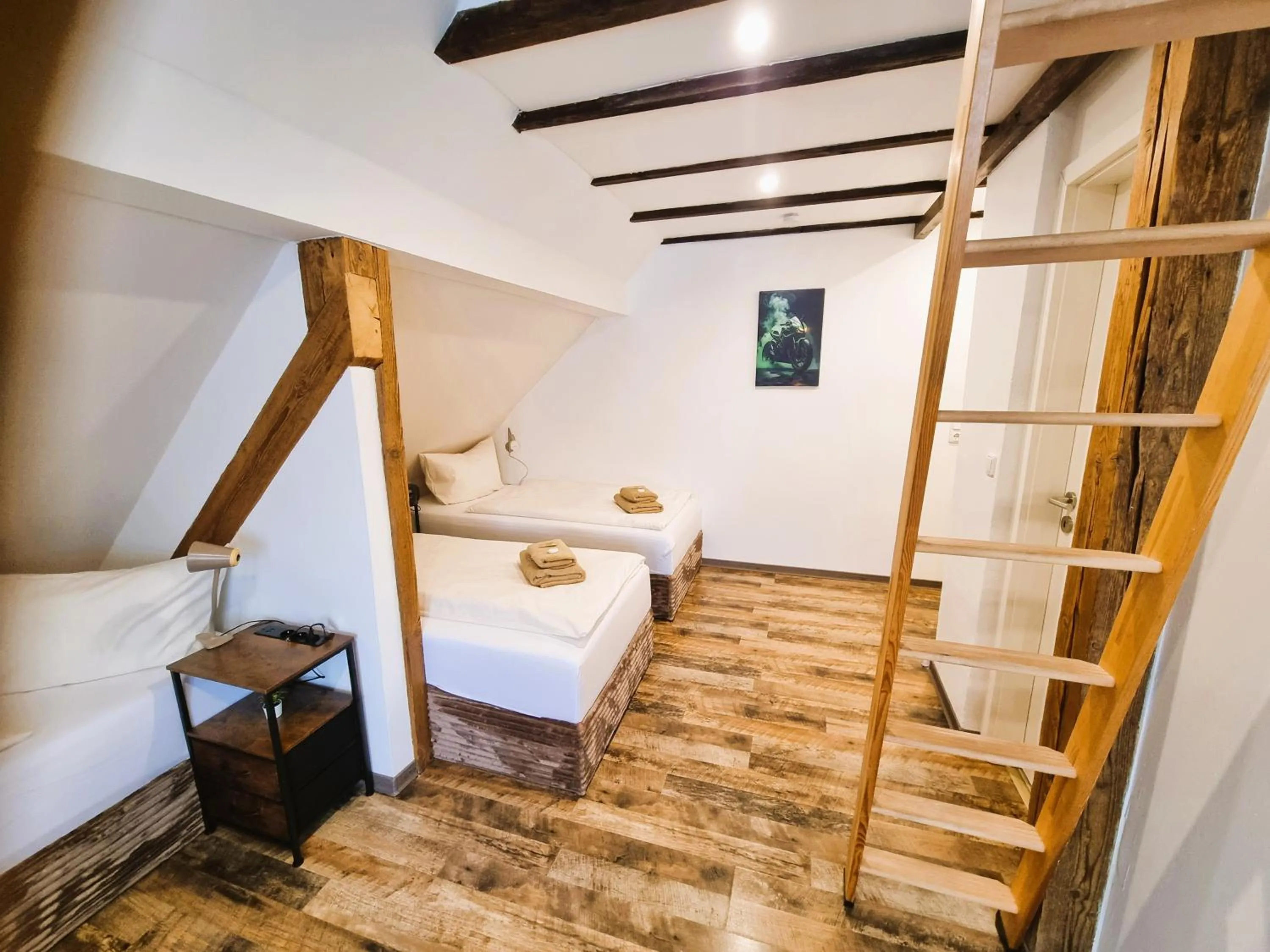 Photo of the whole room, Bed in CJS Apartments - Chill or Drive am Nürburgring, new Box Spring Beds, new furniture, WLan, Spacious Rooms, Quiet Location