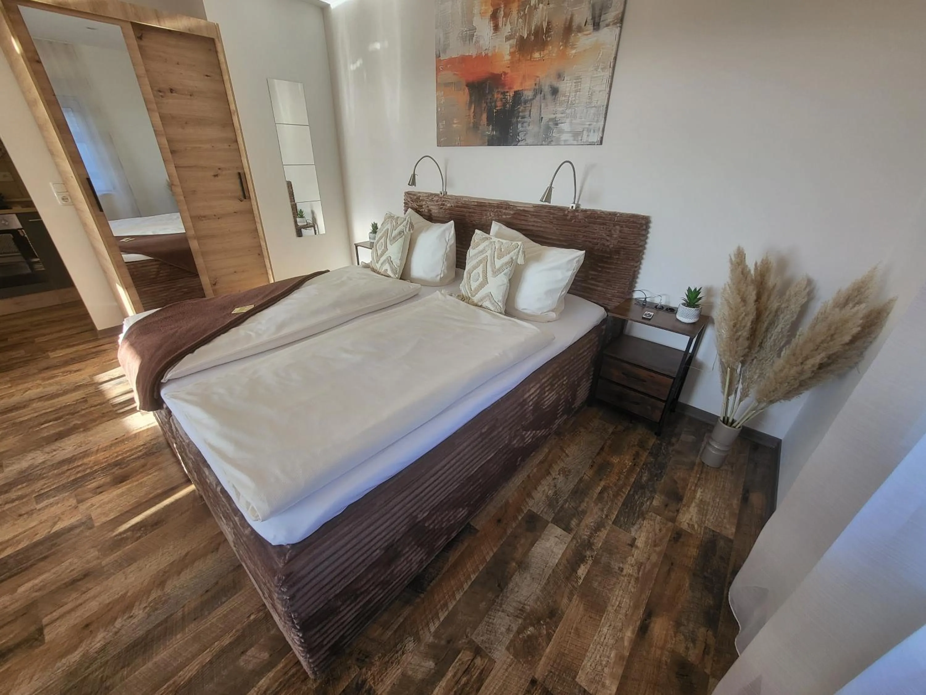 Bed in CJS Apartments - Chill or Drive am Nürburgring, new Box Spring Beds, new furniture, WLan, Spacious Rooms, Quiet Location