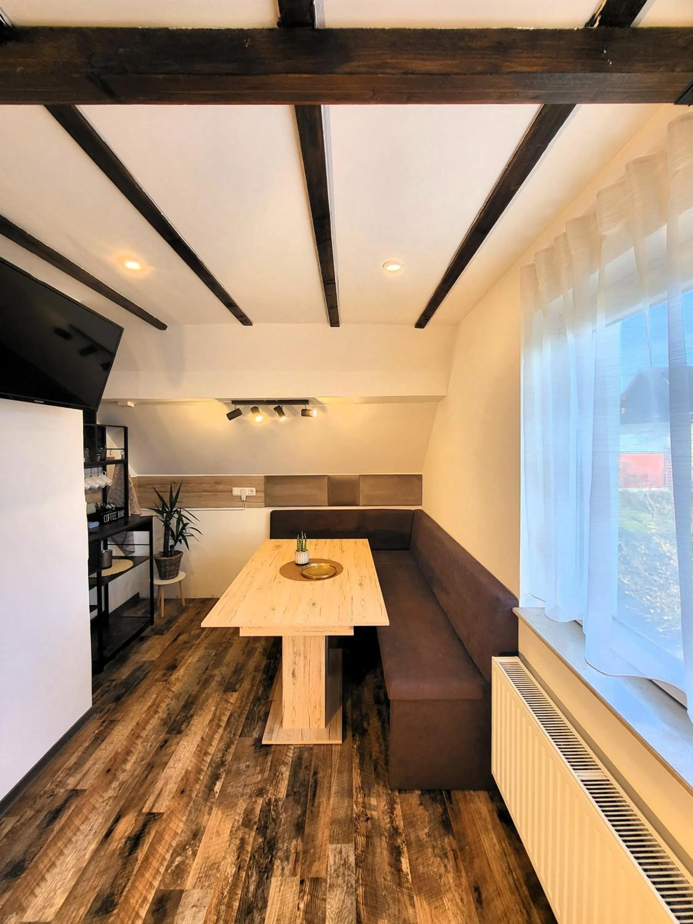 Photo of the whole room in CJS Apartments - Chill or Drive am Nürburgring, new Box Spring Beds, new furniture, WLan, Spacious Rooms, Quiet Location