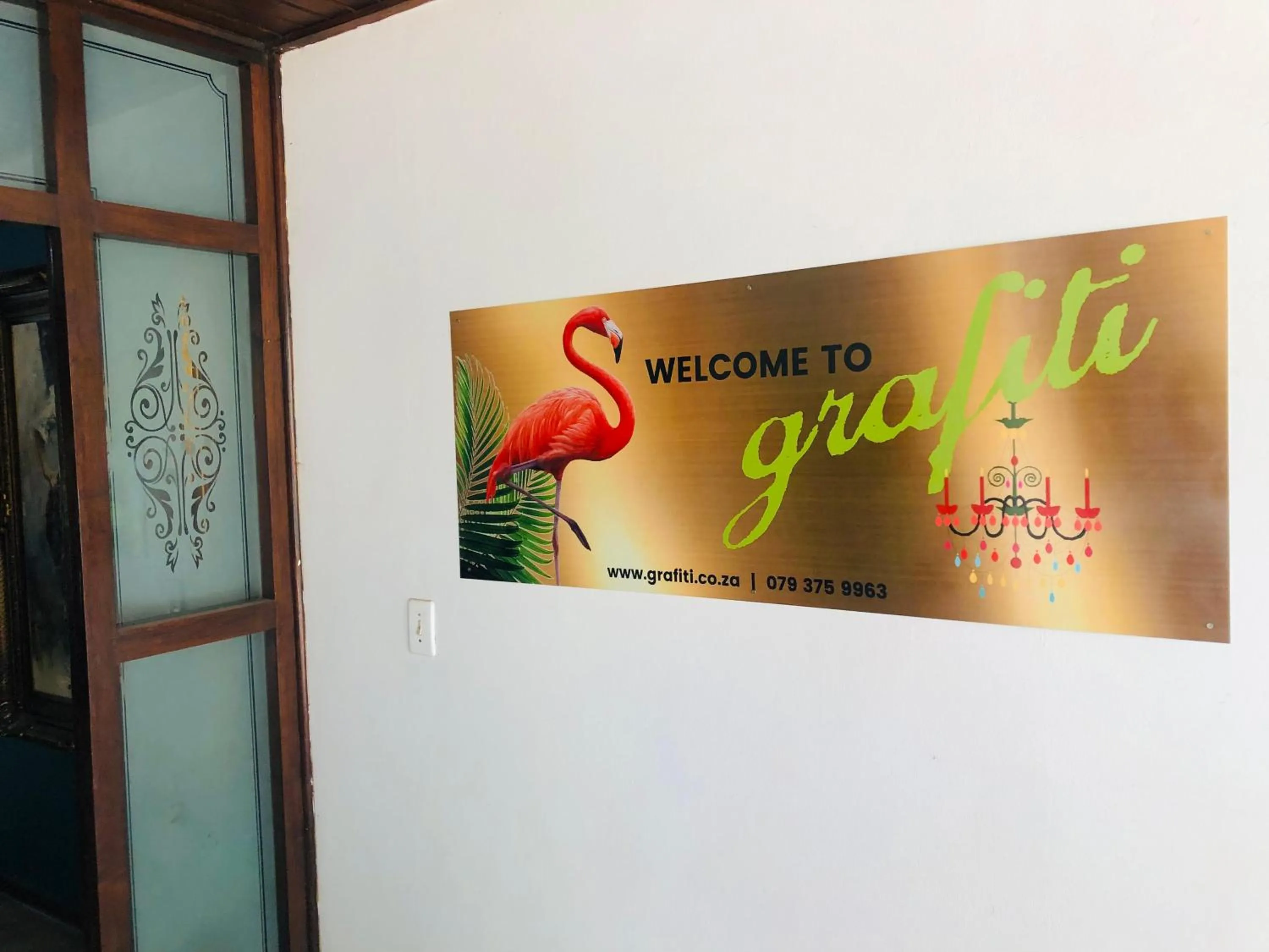 Logo/Certificate/Sign in Grafiti Boutique Hotel