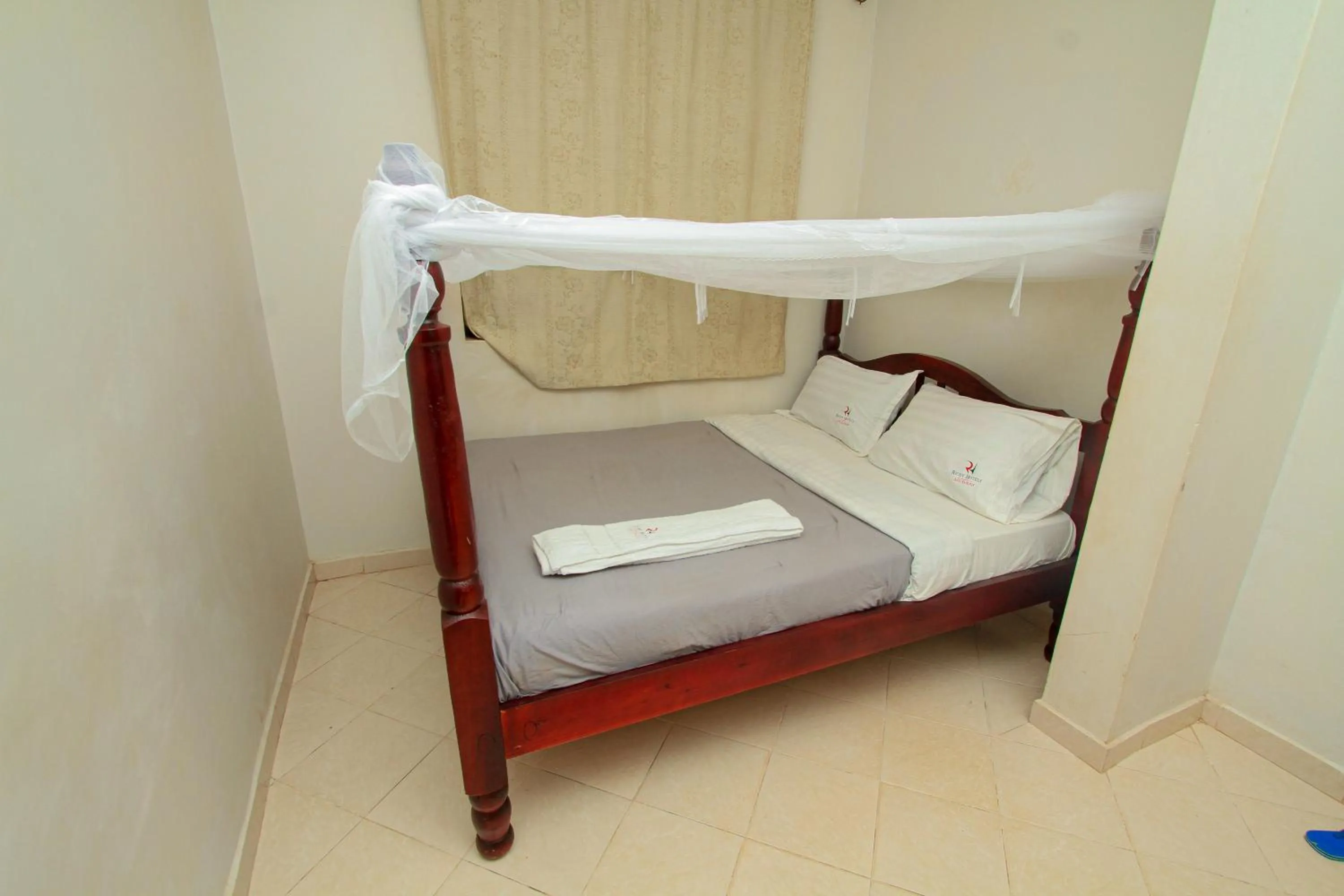 Photo of the whole room, Bed in Richy Hotels and Safaris