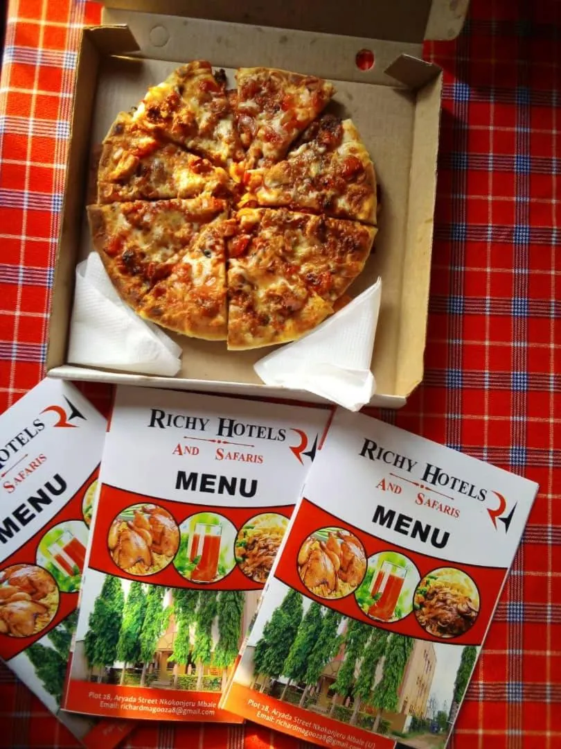 Property logo or sign in Richy Hotels and Safaris