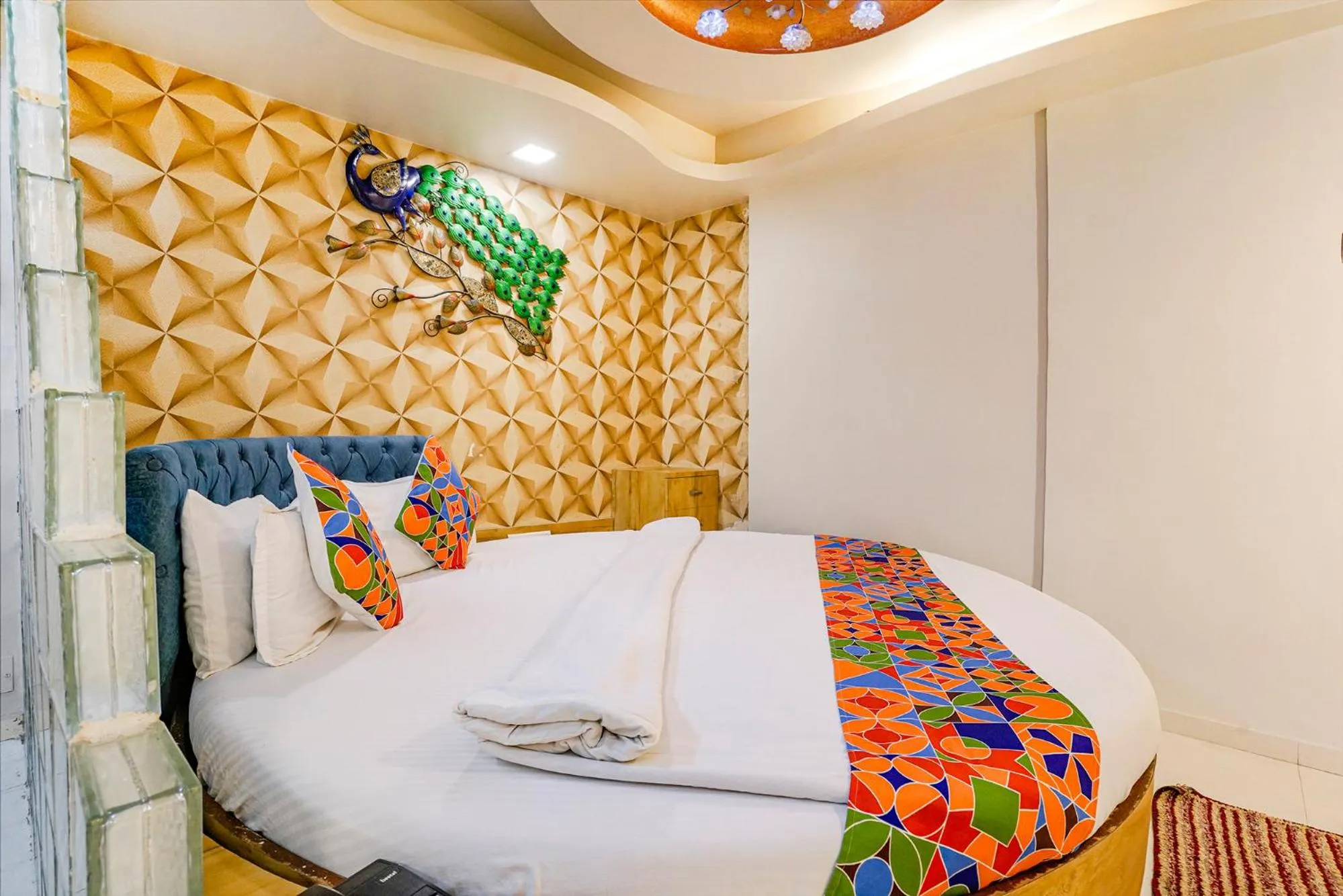 Bed in FabHotel Amber Corp Inn