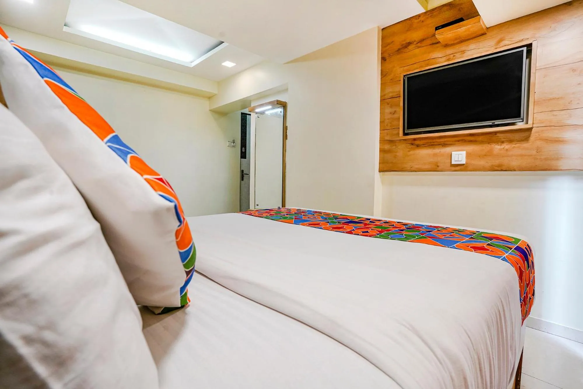 Bed in FabHotel Amber Corp Inn