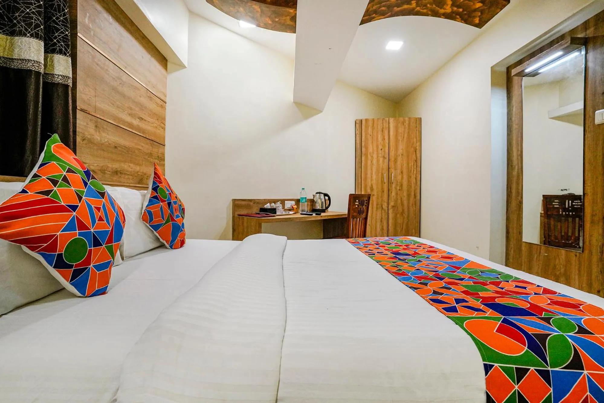 Bed in FabHotel Amber Corp Inn