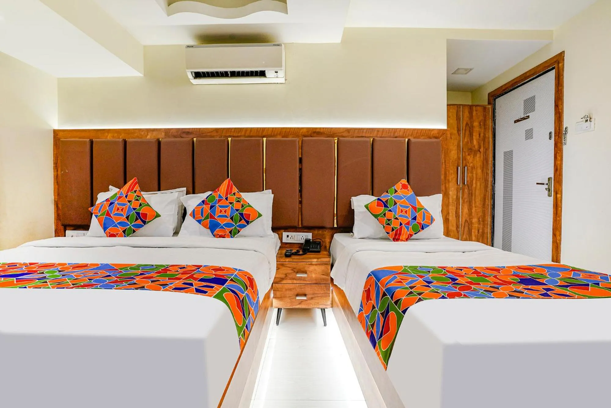 Bed in FabHotel Amber Corp Inn