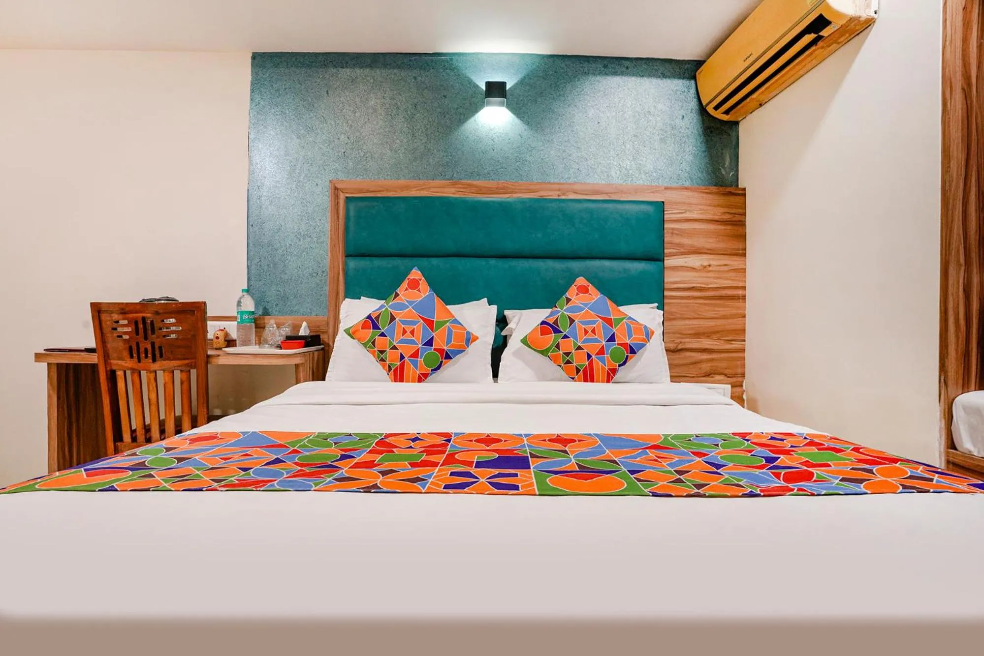 Bed in FabHotel Amber Corp Inn