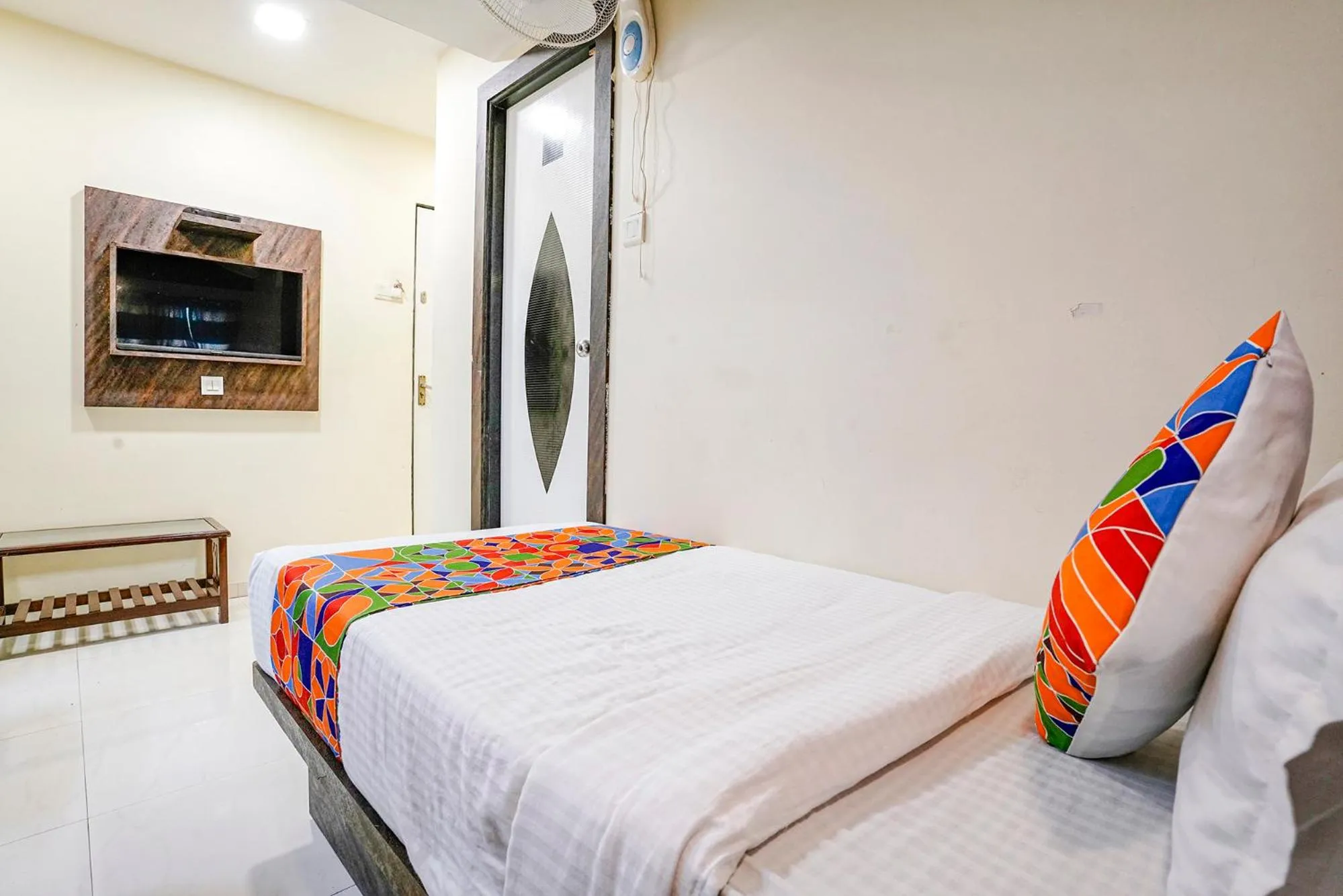 Bed in FabHotel Amber Corp Inn