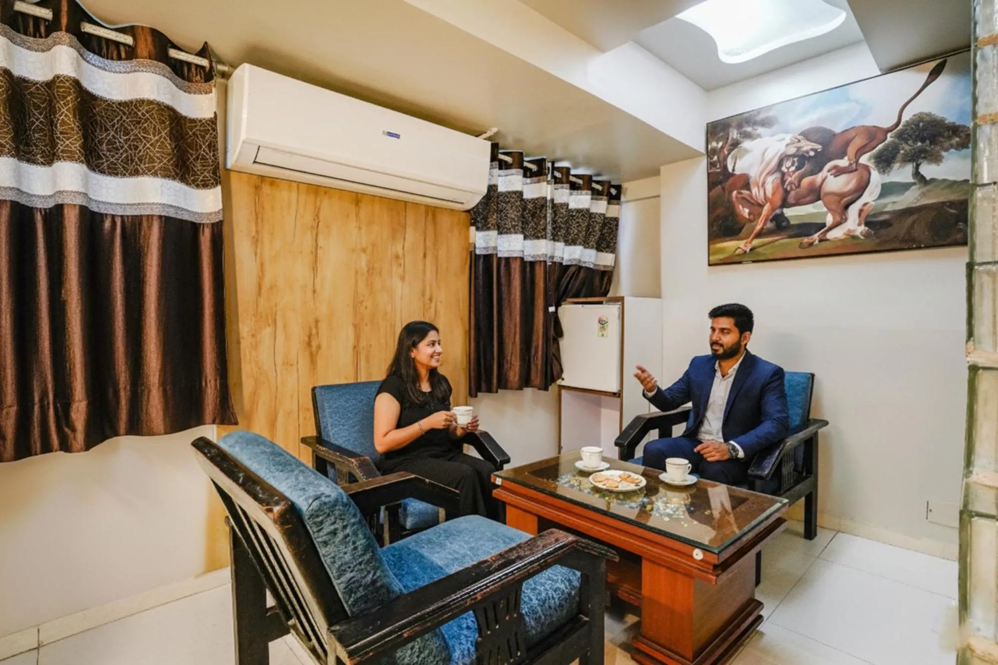 Seating area in FabHotel Amber Corp Inn