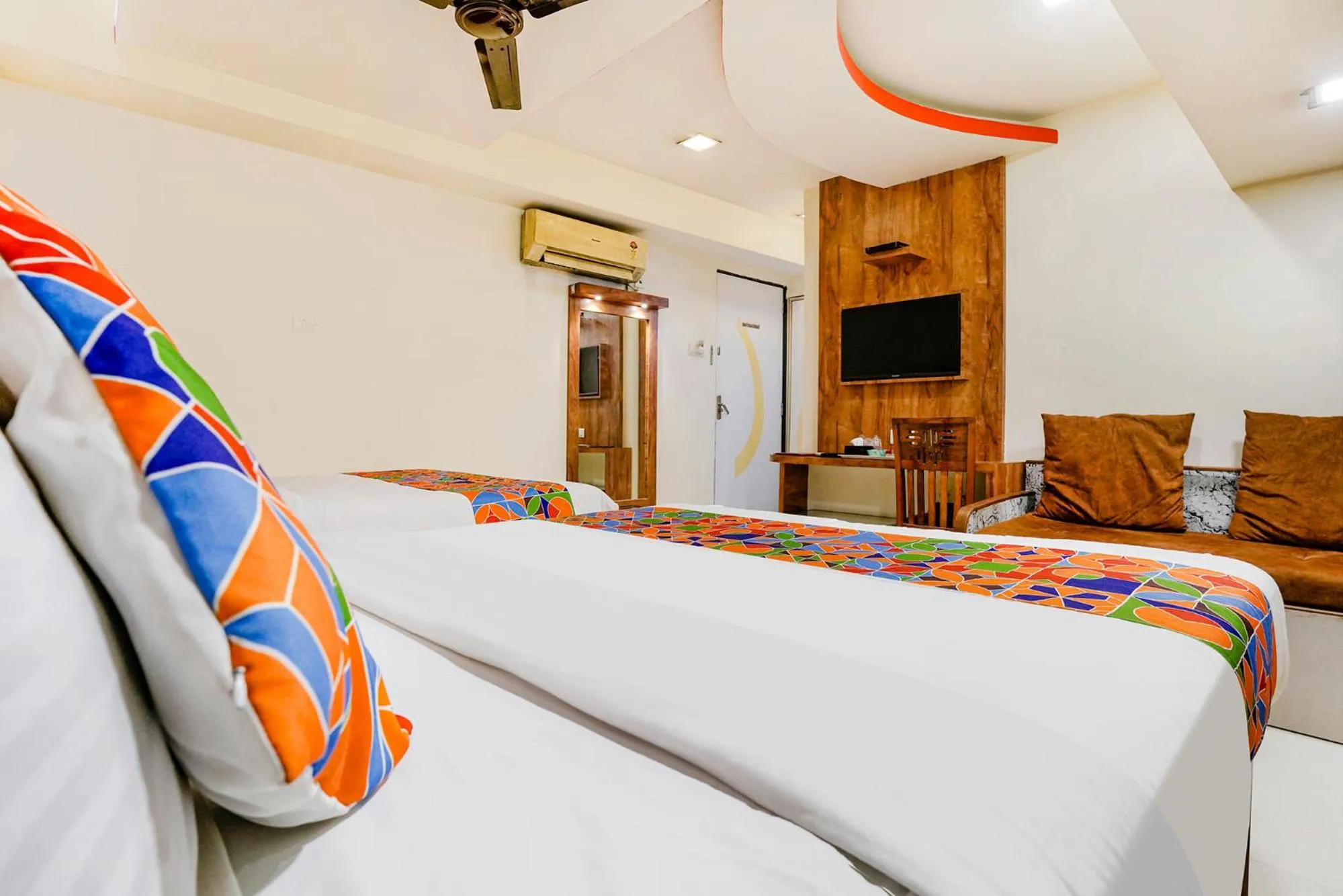 Bed in FabHotel Amber Corp Inn