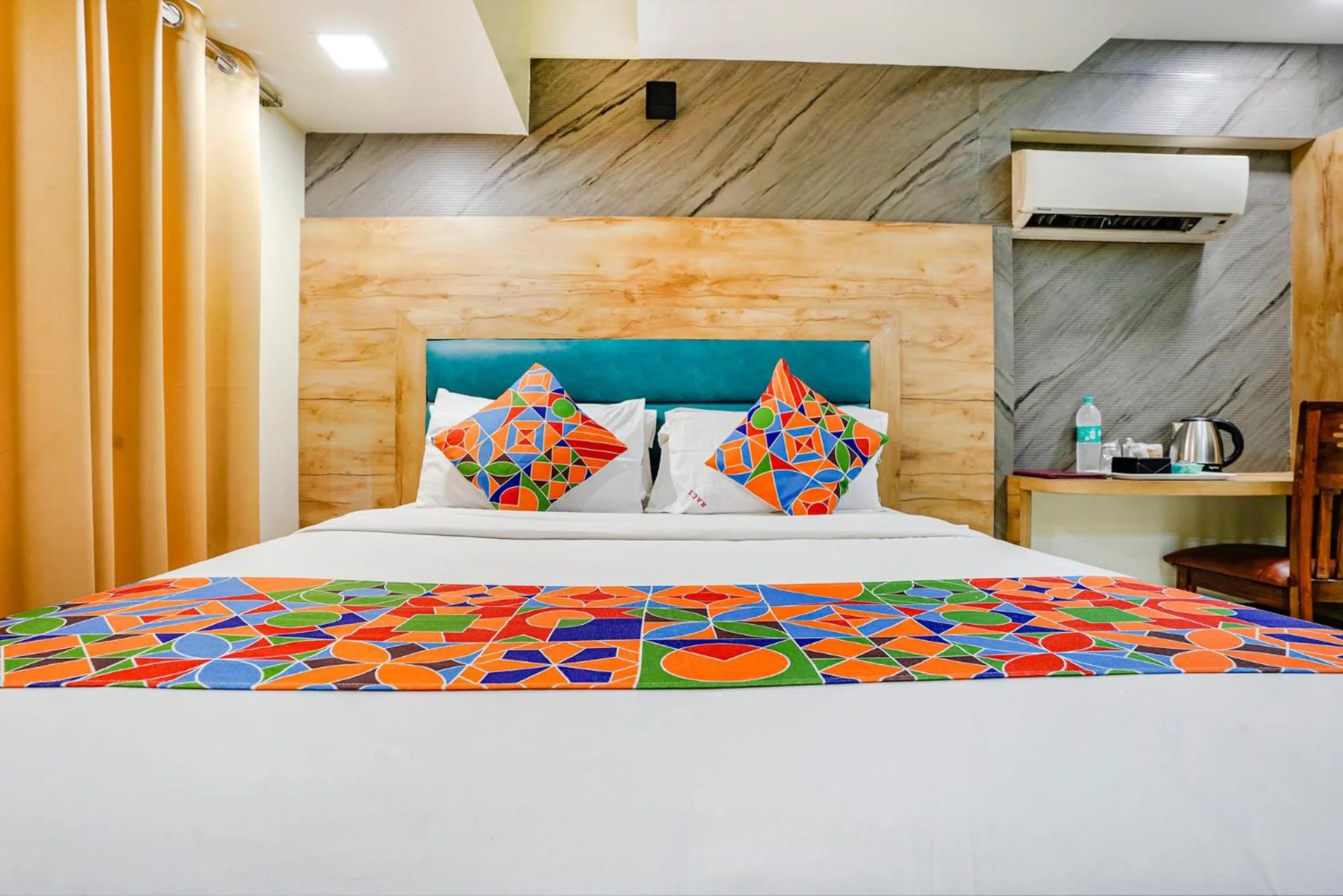 Bed in FabHotel Amber Corp Inn