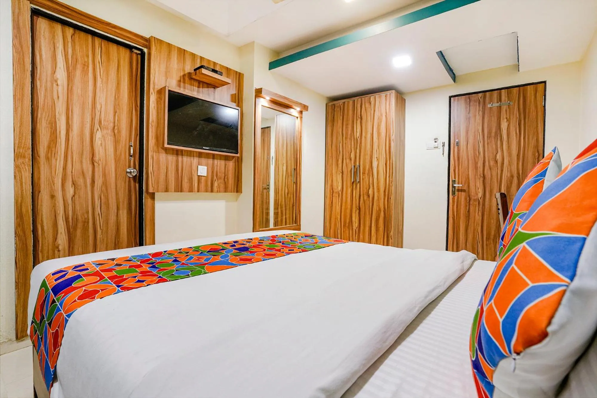 Bed in FabHotel Amber Corp Inn