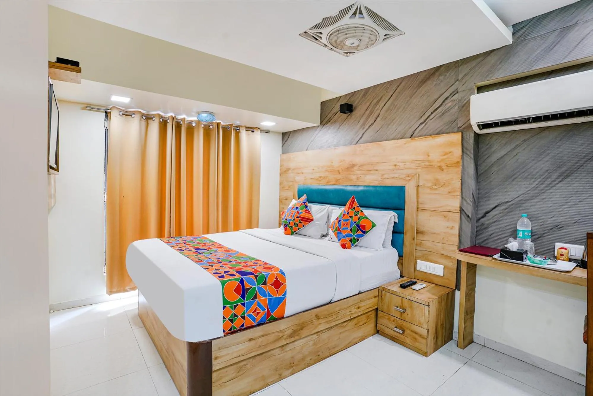 Bed in FabHotel Amber Corp Inn