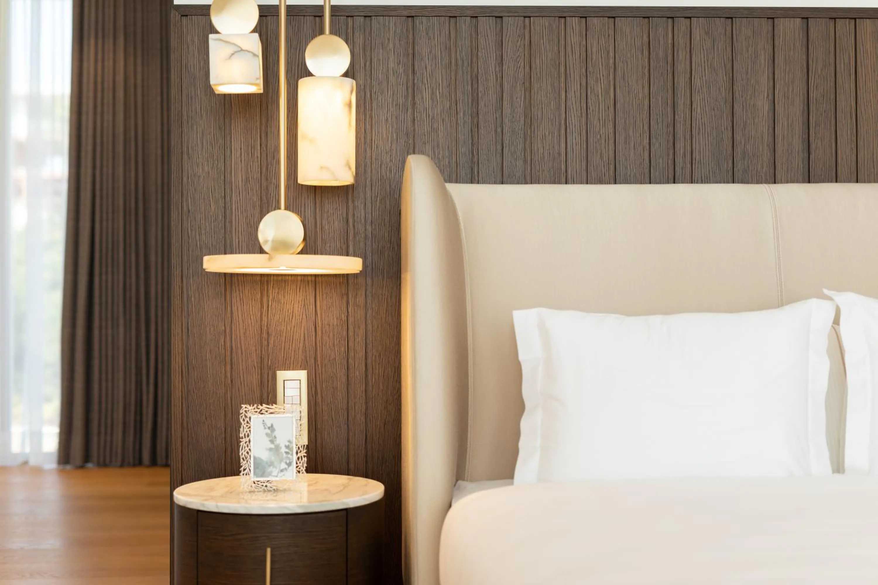 Bed in Hiddenbay Teos Hotel