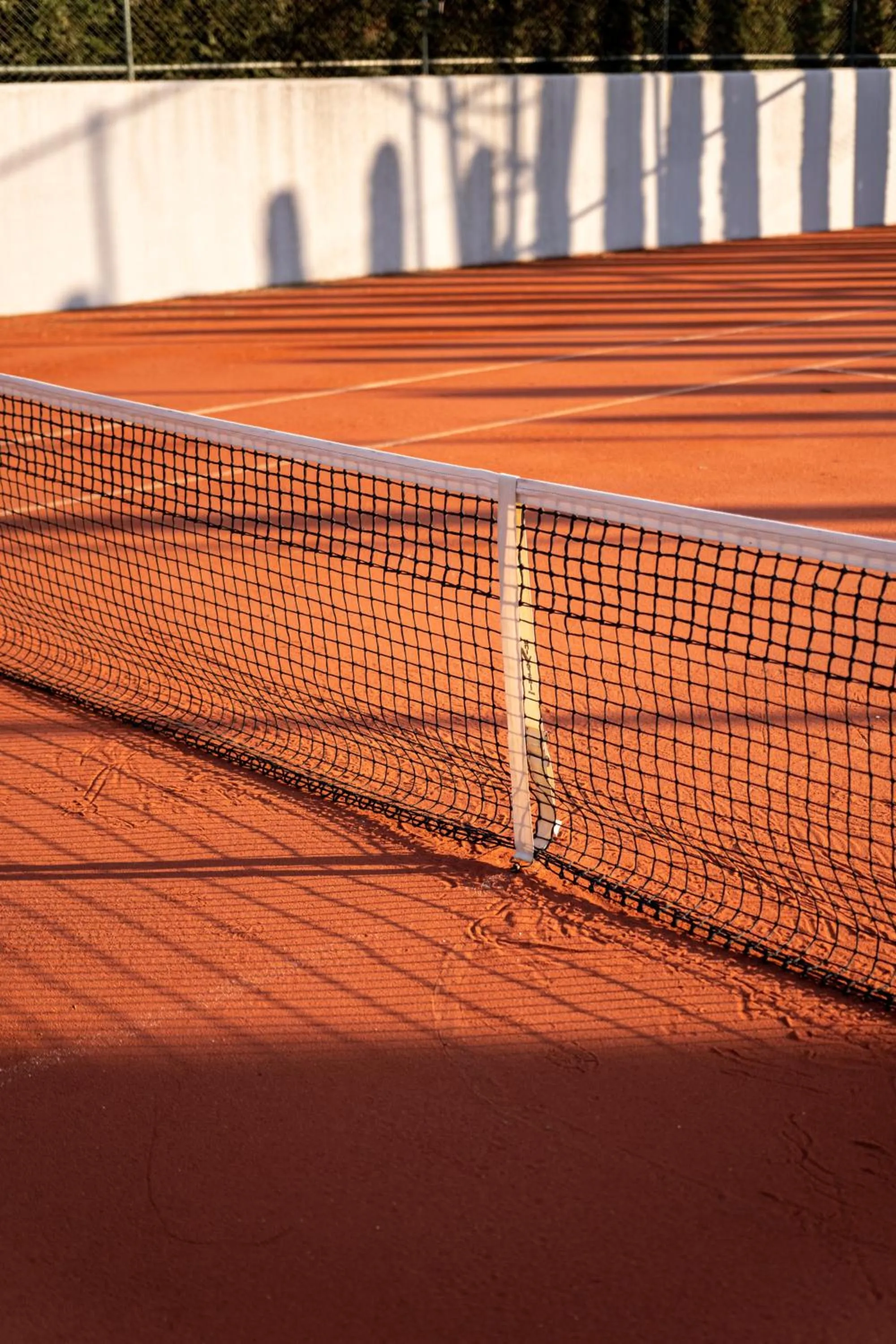 Tennis court in Hiddenbay Teos Hotel