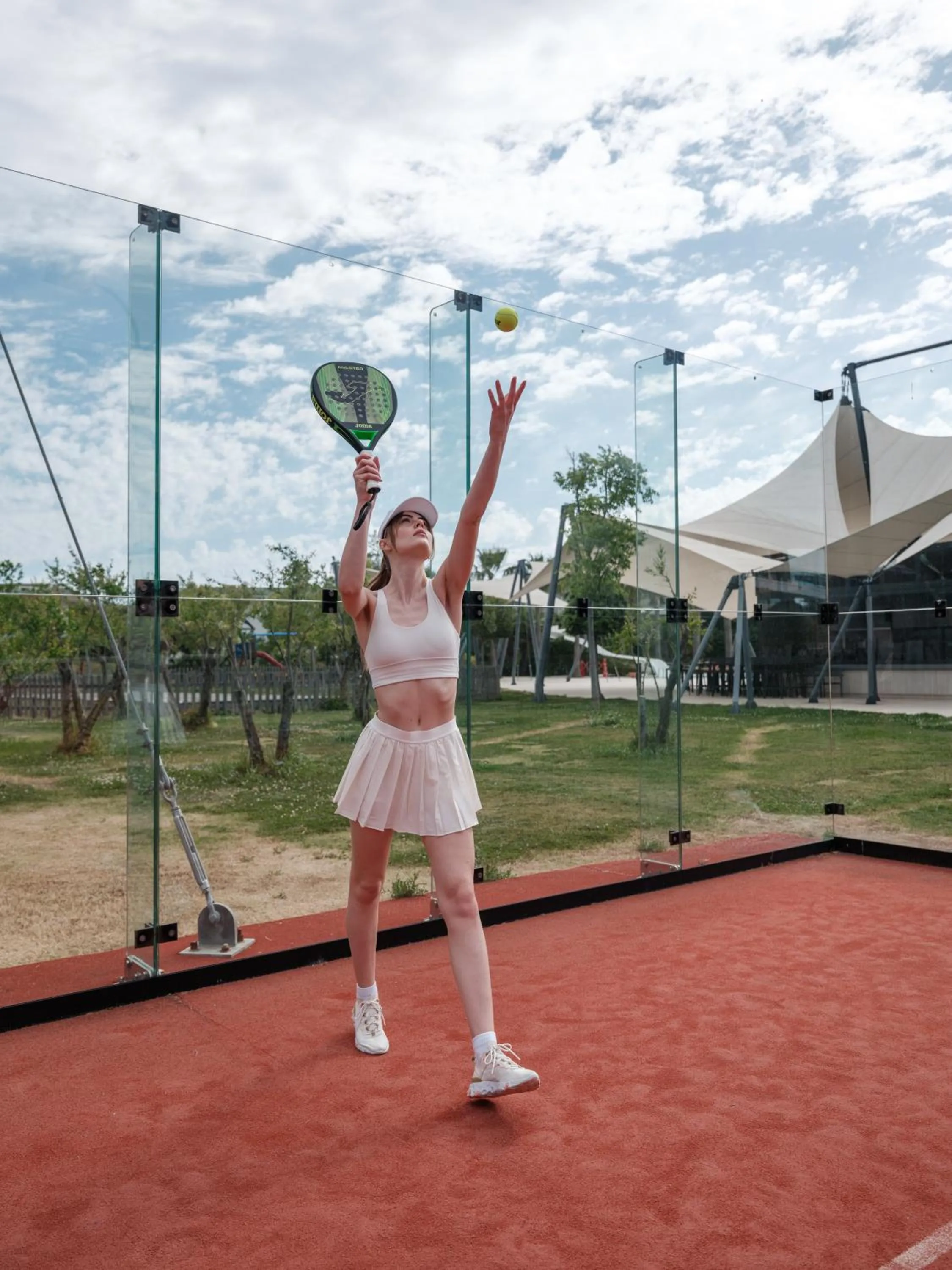 Tennis court in Hiddenbay Teos Hotel