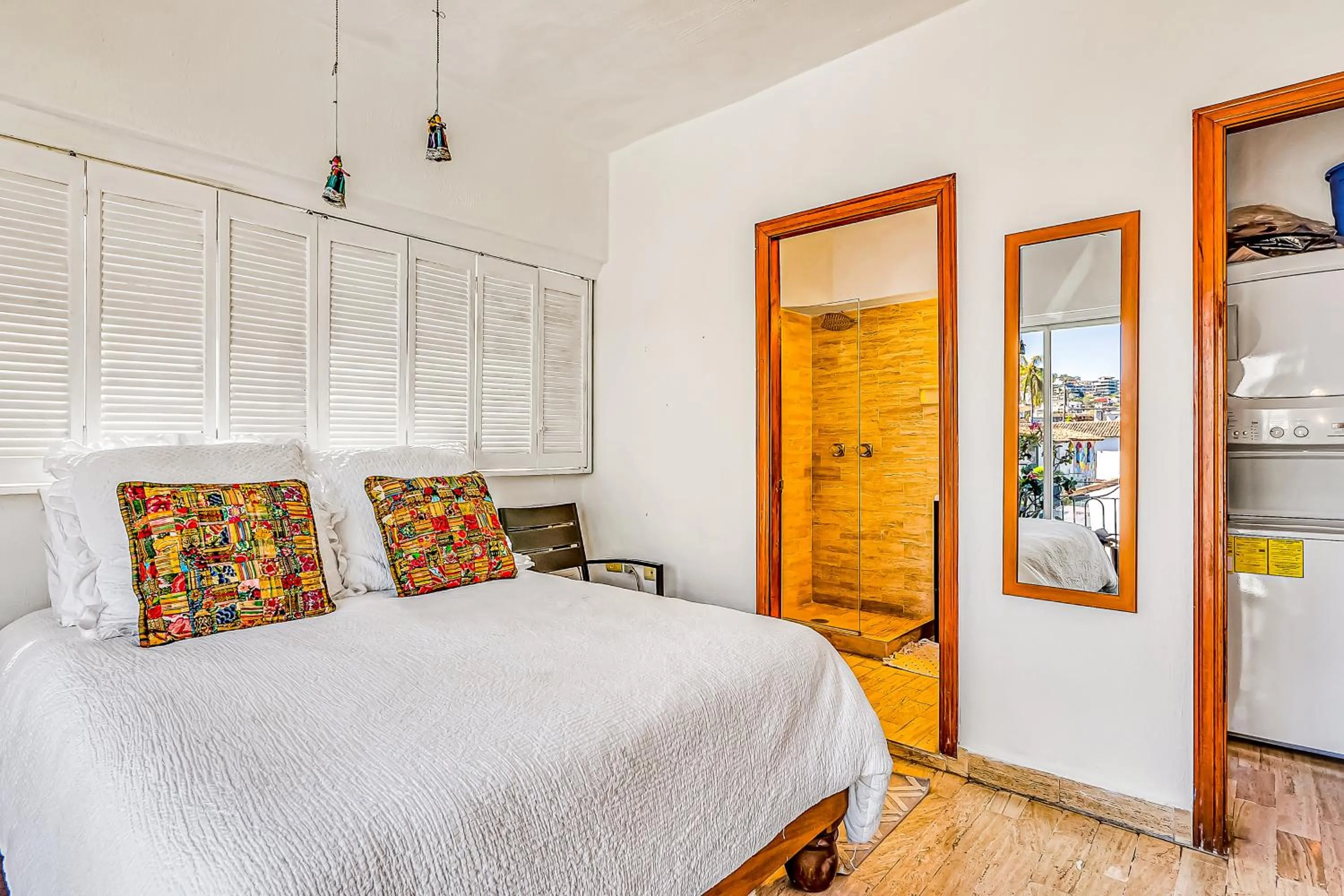 Bed in Malecon Beach Side Downtown Condo