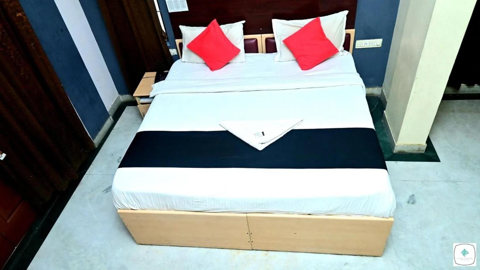 Bed in The Roy Grand Inns