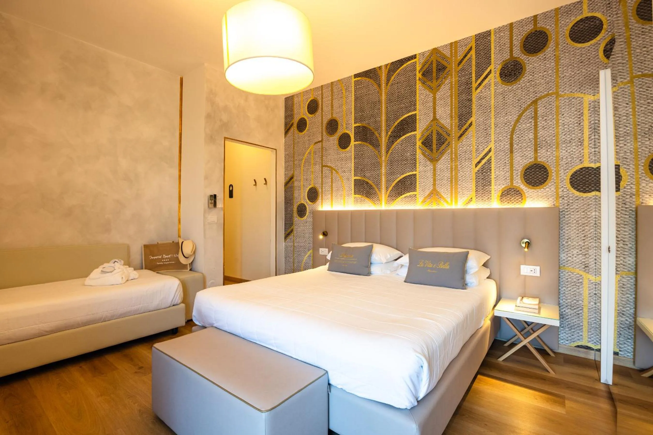 Bed in UNAHOTELS Imperial Sport Hotel