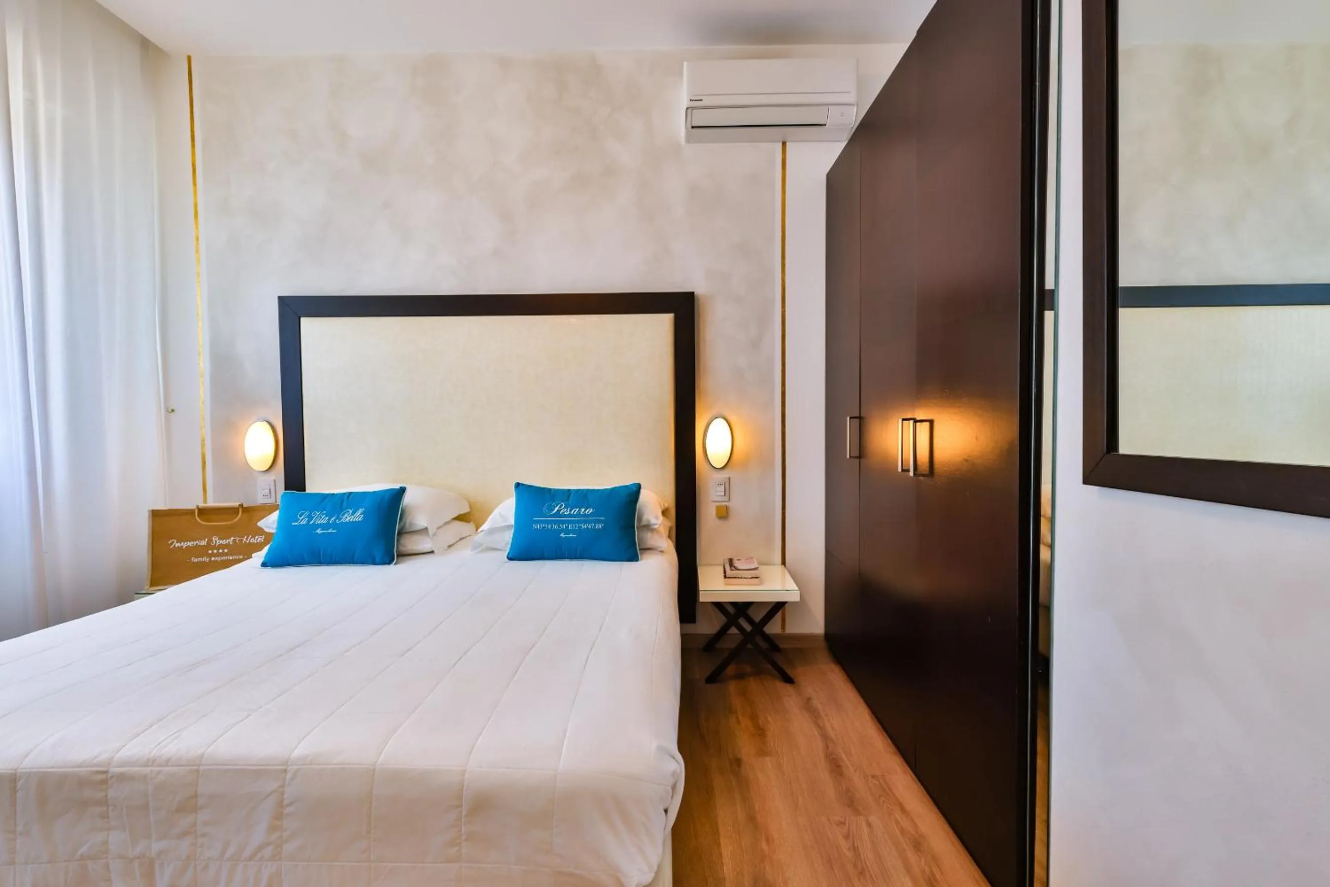 Bed in UNAHOTELS Imperial Sport Hotel