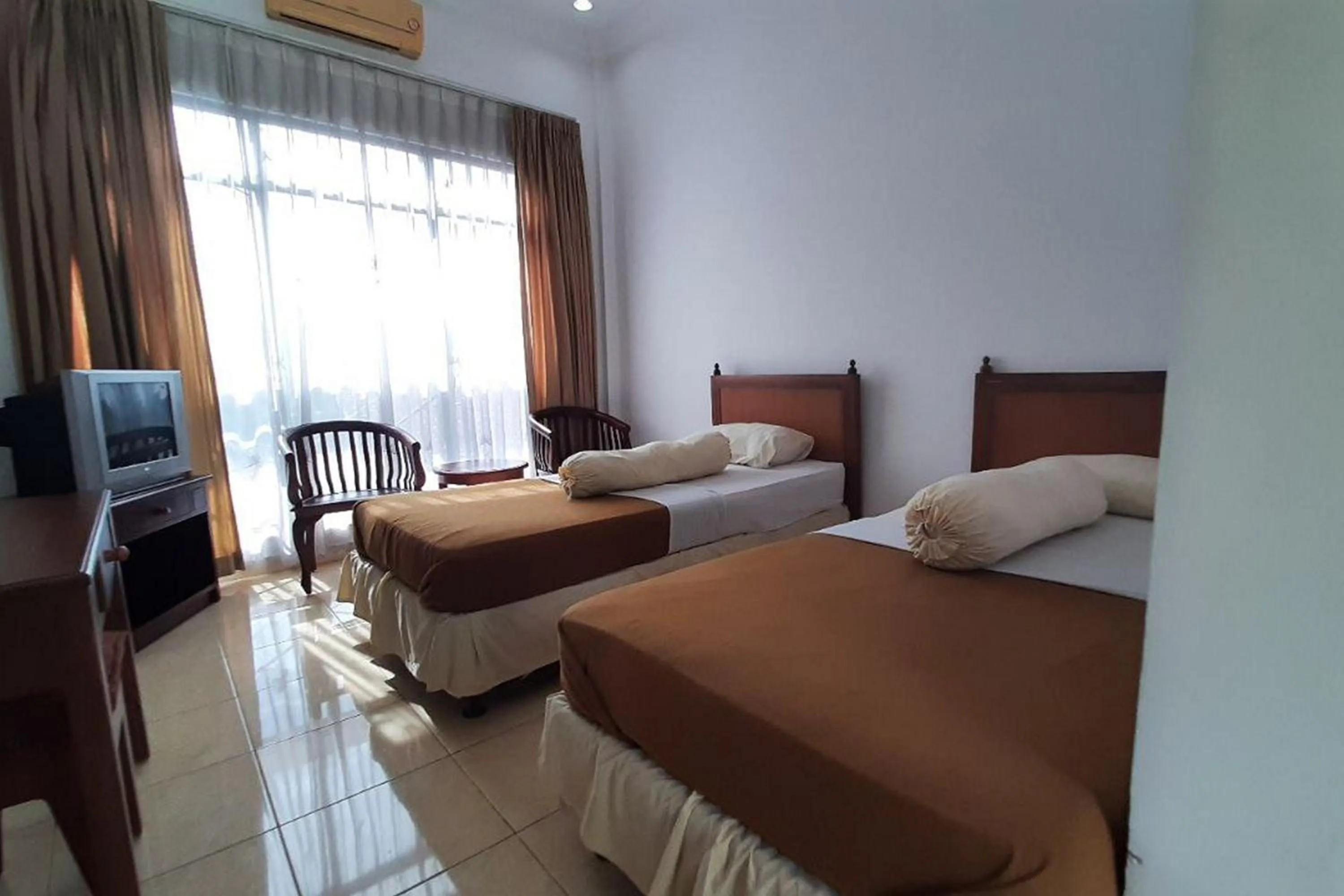 Bed in Hotel Akbar Banyumas RedPartner