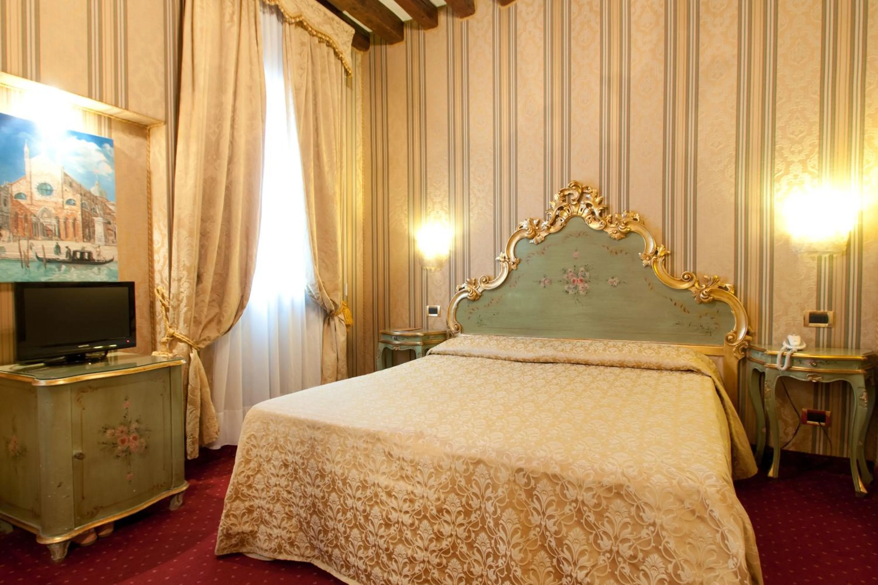 Bed in Hotel al Graspo de Ua