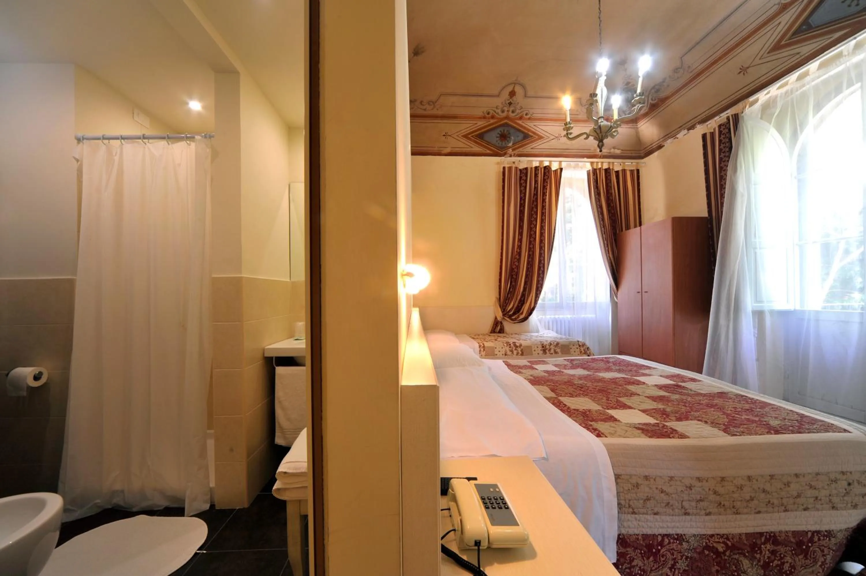 Photo of the whole room, Bed in Hotel Iris