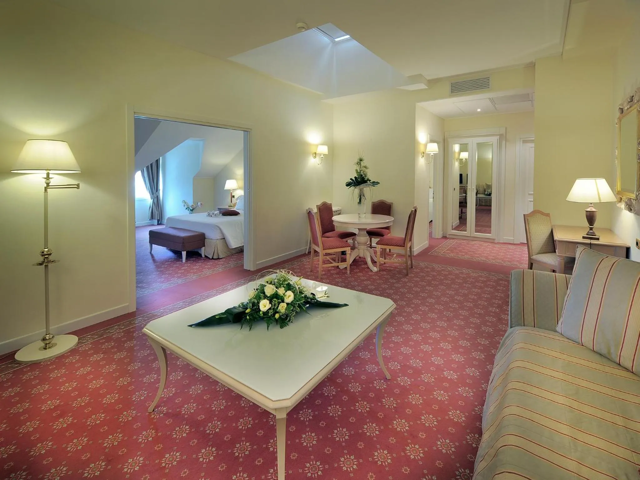 Living room, Bed in Gardaland Hotel