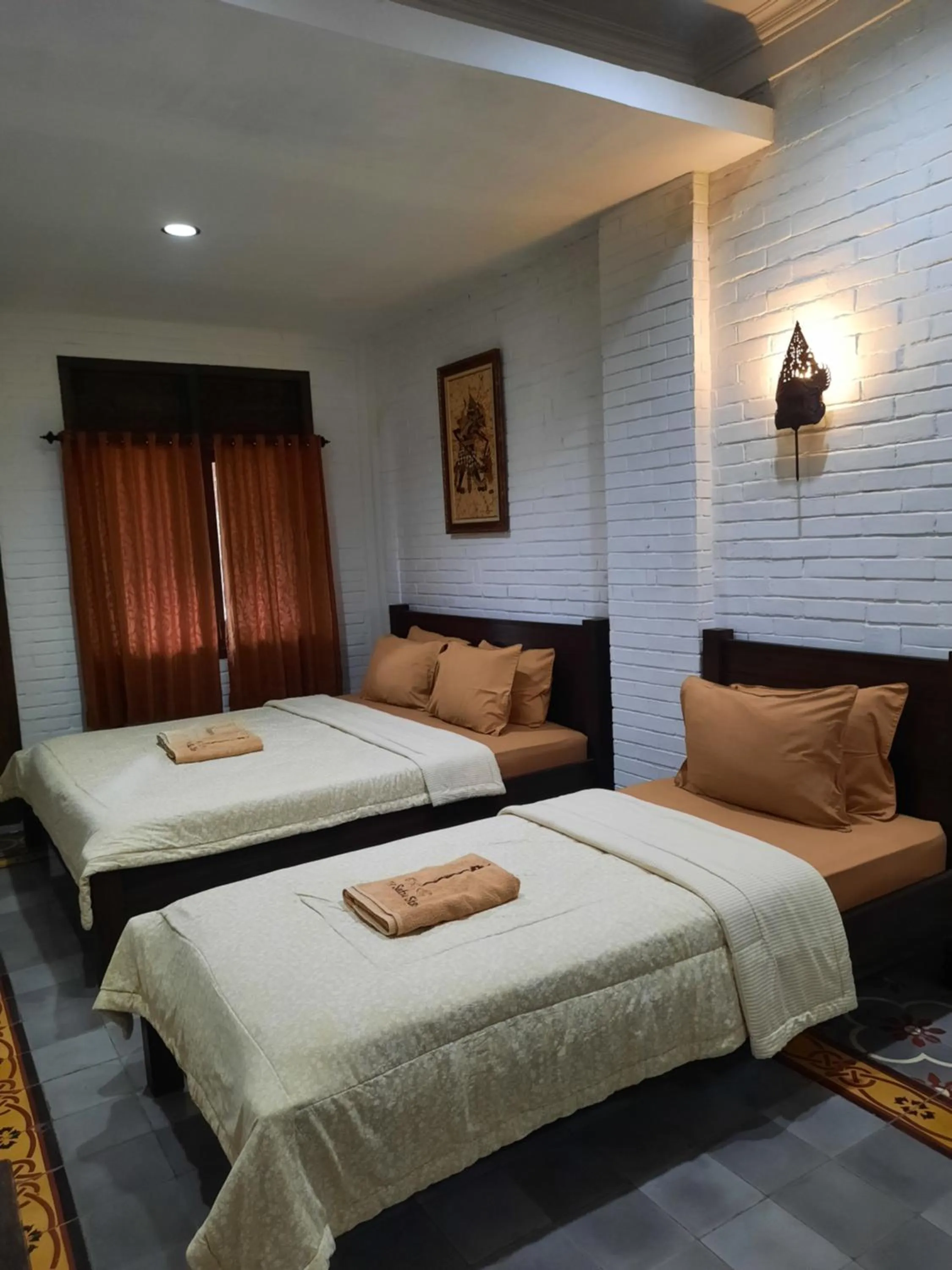 Bed in The Satu Stay Kayen