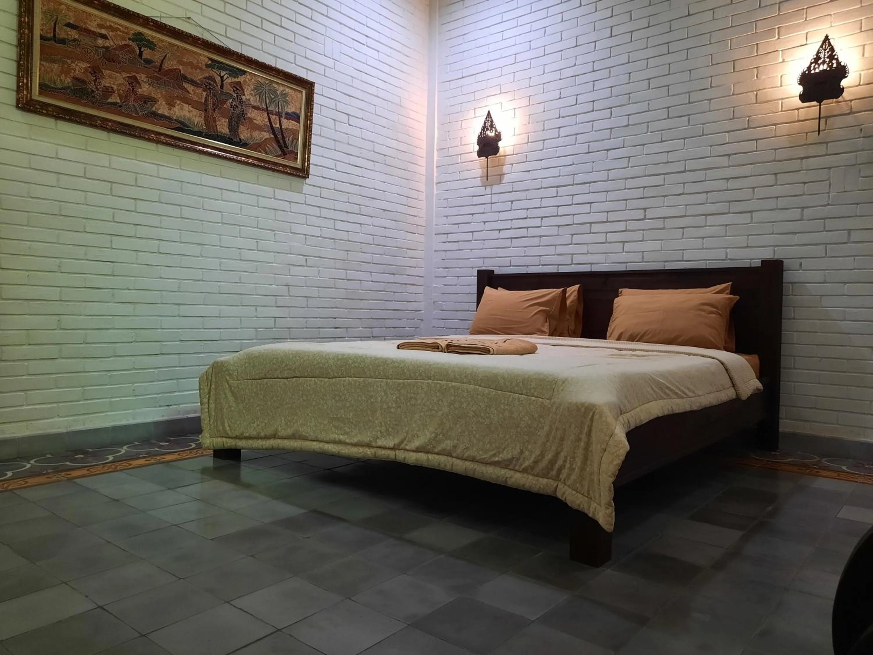 Bed in The Satu Stay Kayen