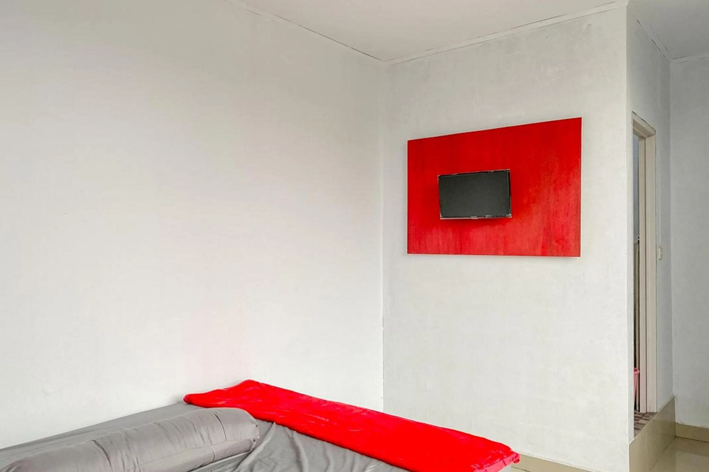 Bed in Sky Residence Tomohon Mitra RedDoorz