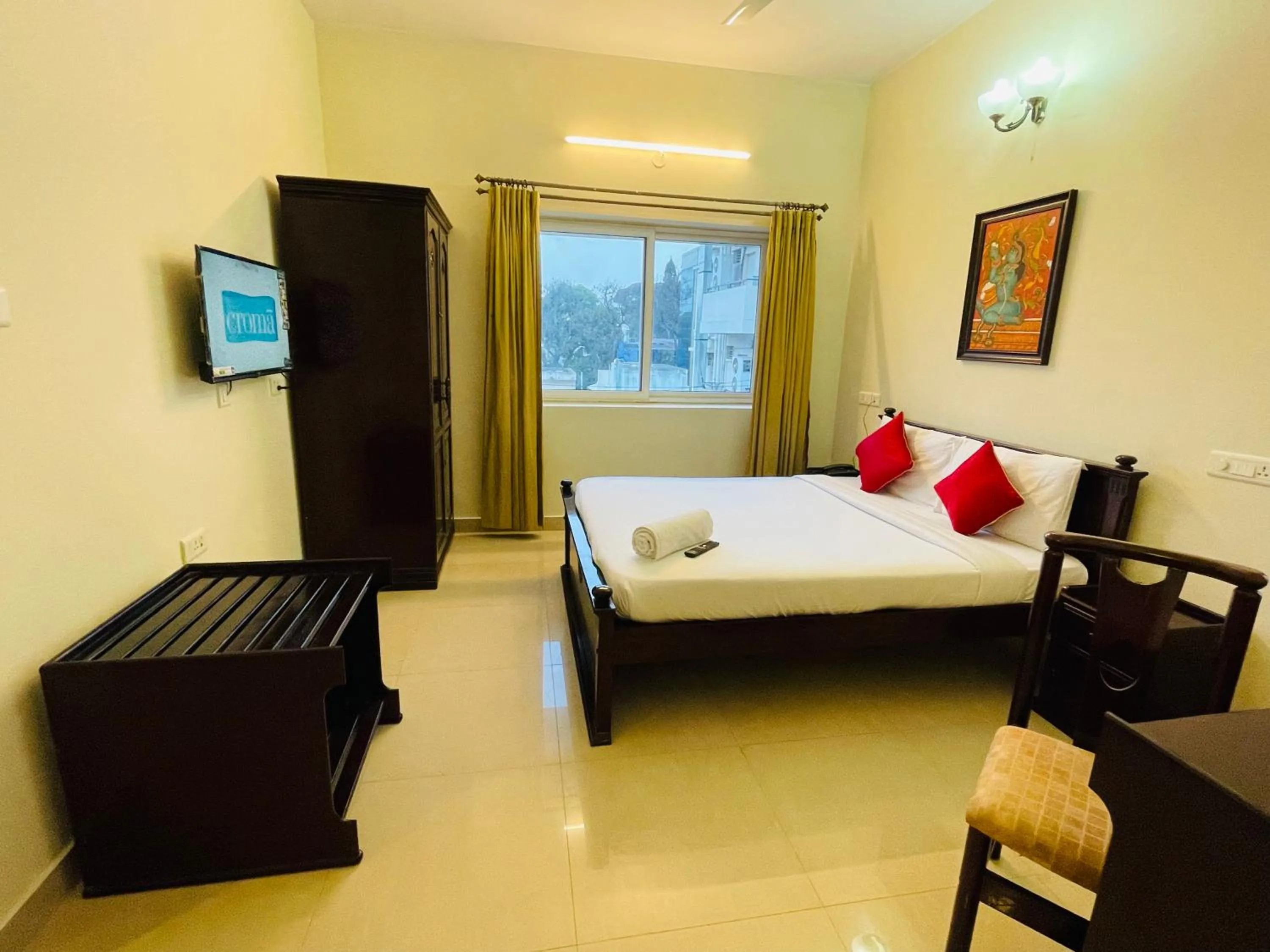 Photo of the whole room, Bed in Sanctum Suites Indiranagar Bangalore