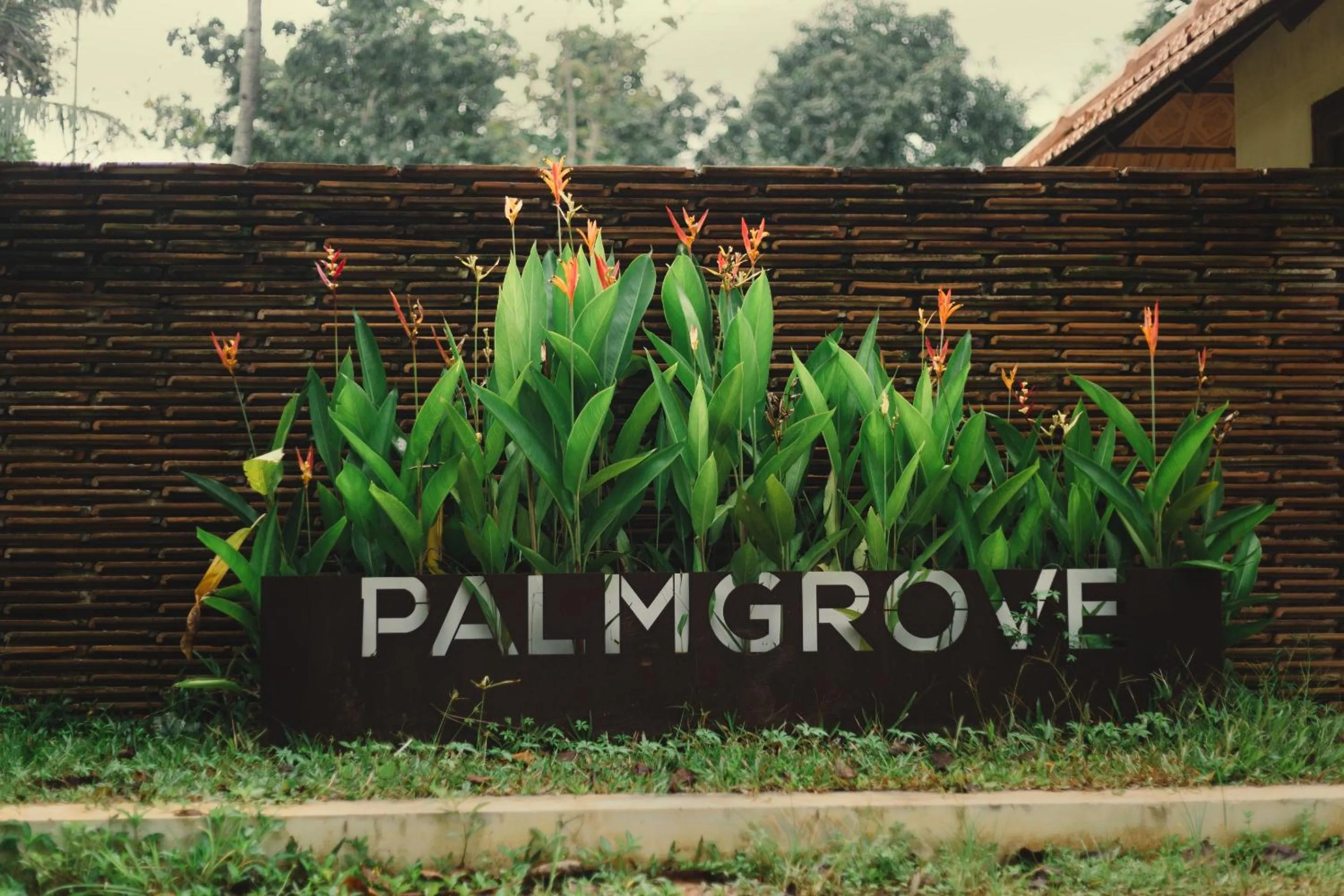 Property logo or sign in Palmgrove Lake Resort
