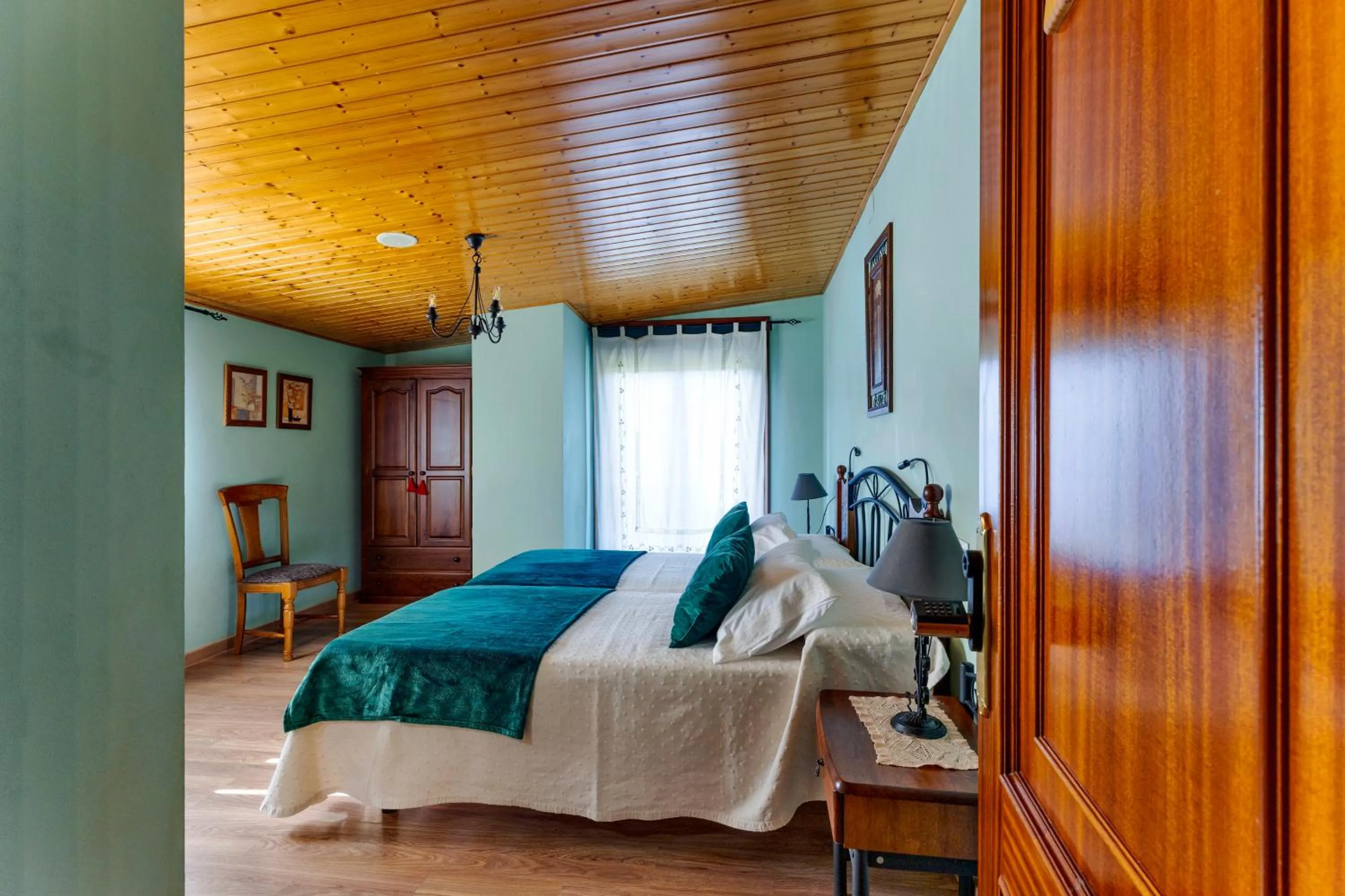 Double Room with Pool View in Casa Rural Os Carballos