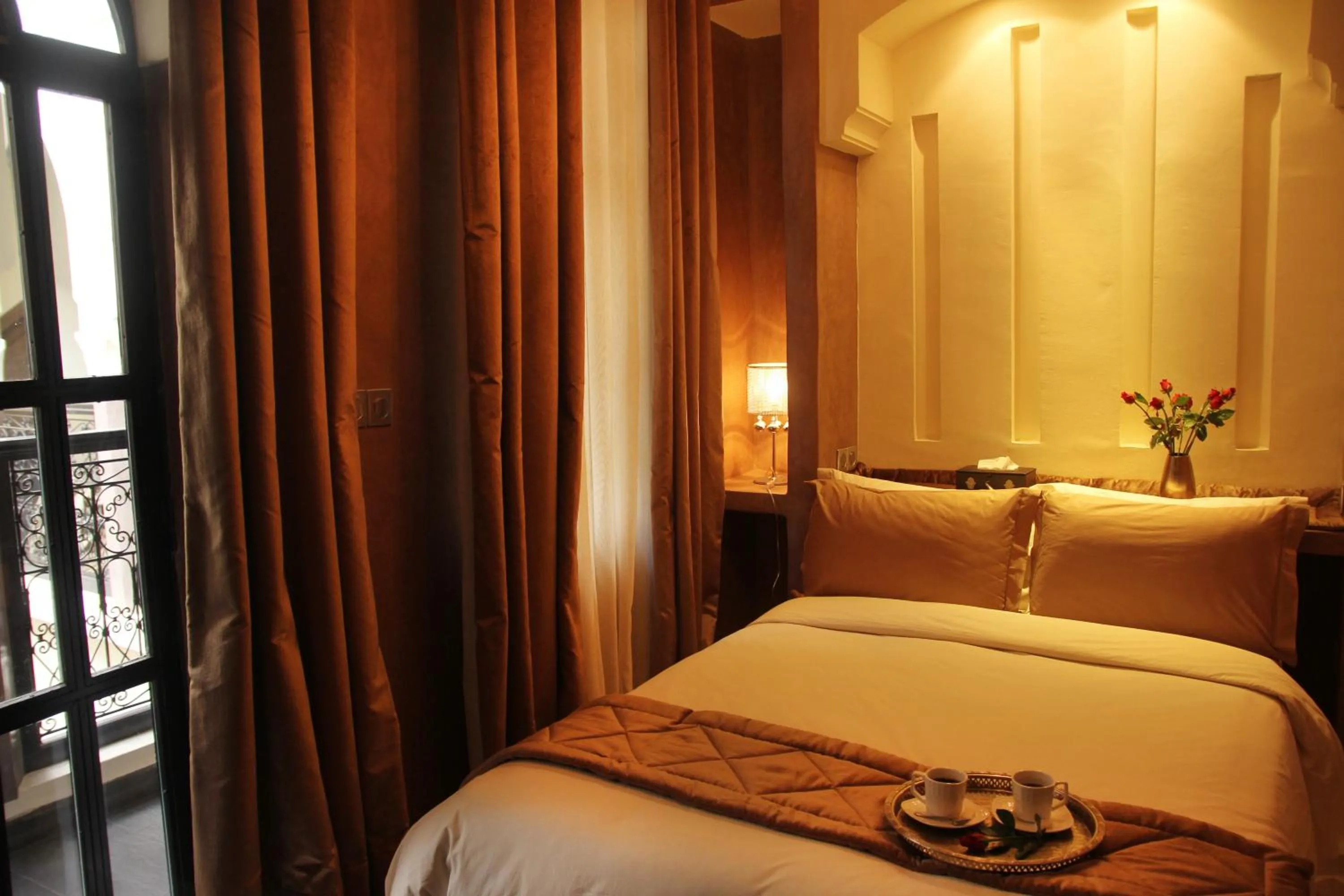 Photo of the whole room, Bed in Riad Carllian