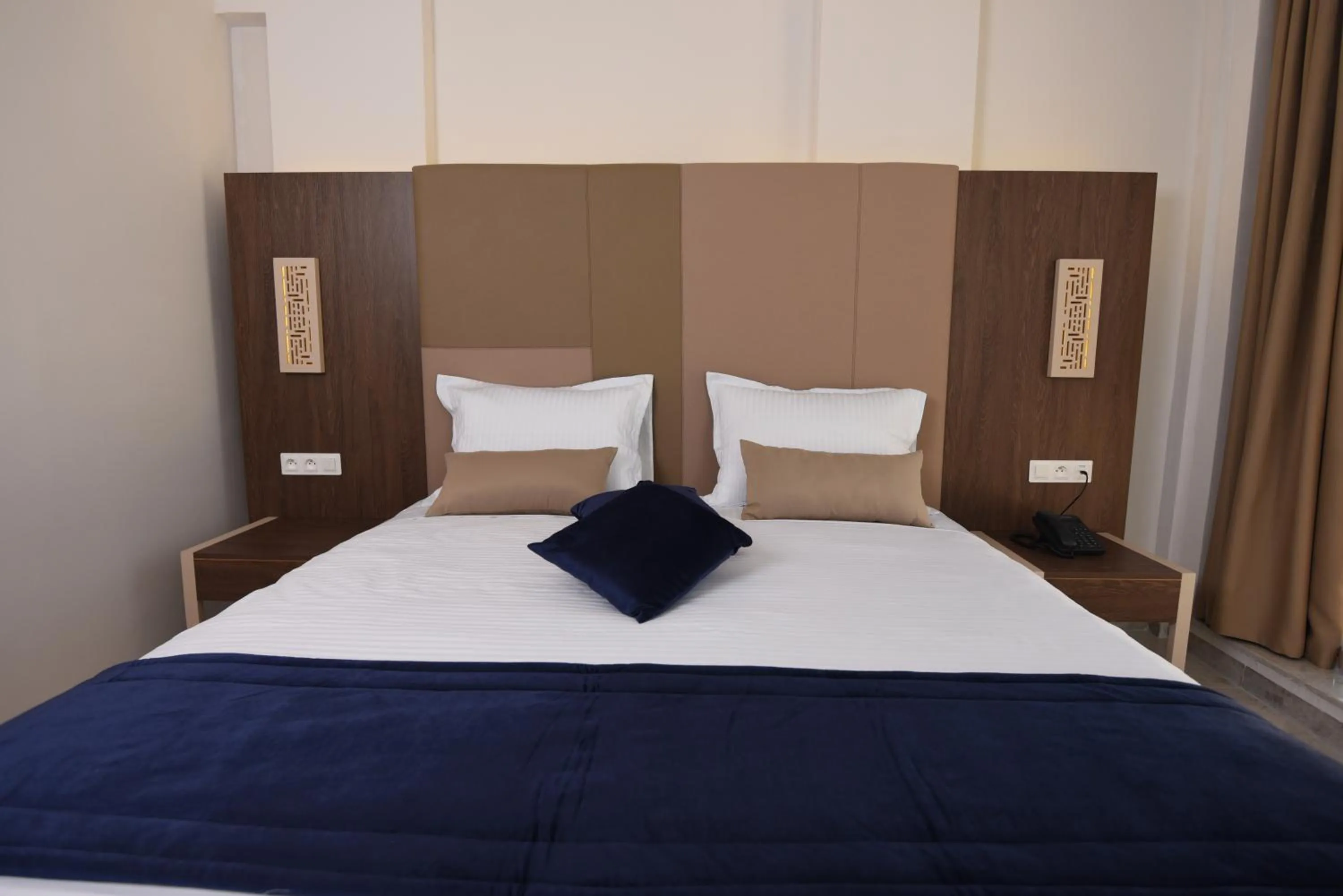 Bed in Hôtel Lescure Business and SPA