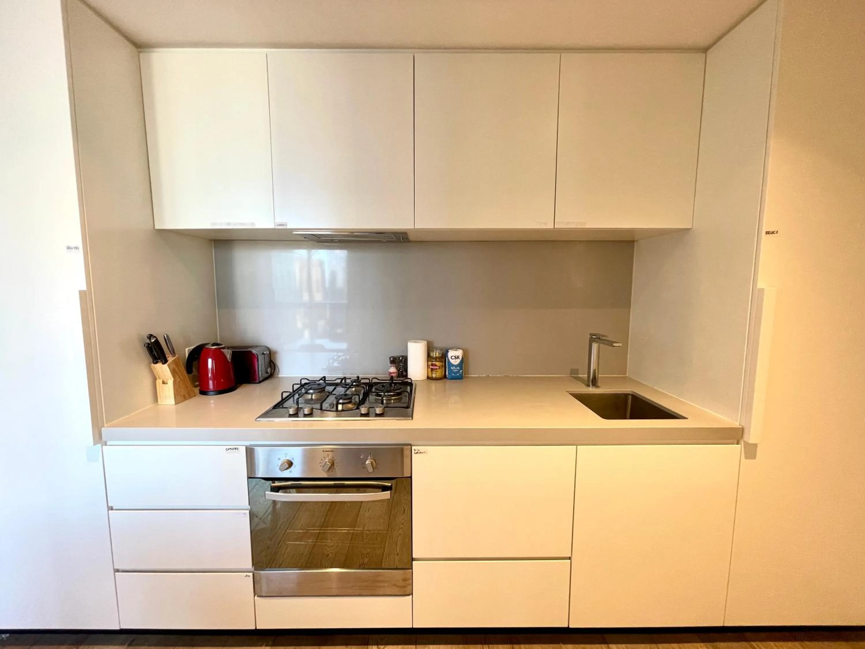 Kitchen or kitchenette in Readyset Apartments at Empire