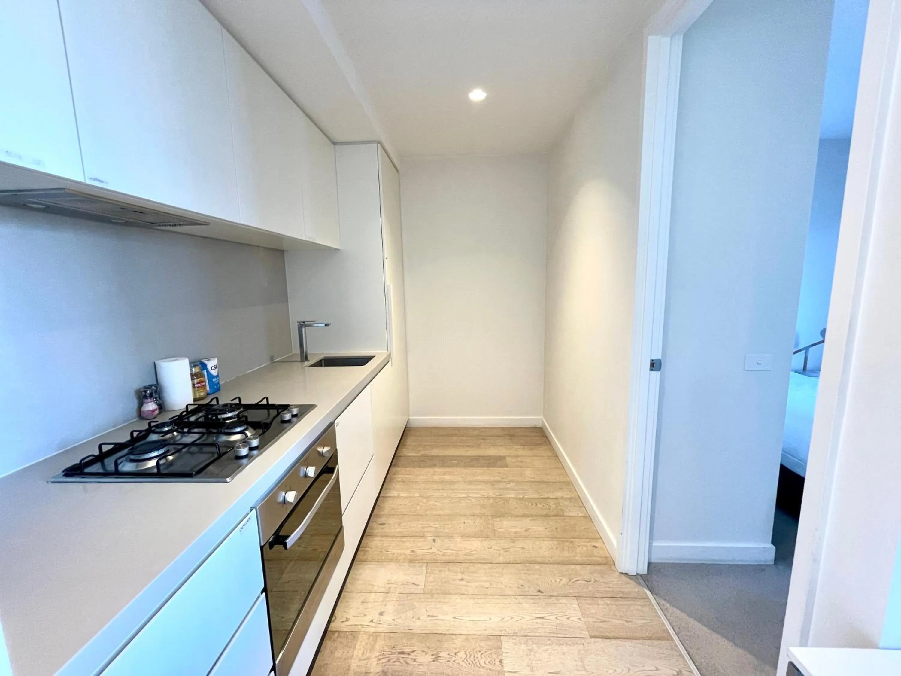 Kitchen or kitchenette in Readyset Apartments at Empire