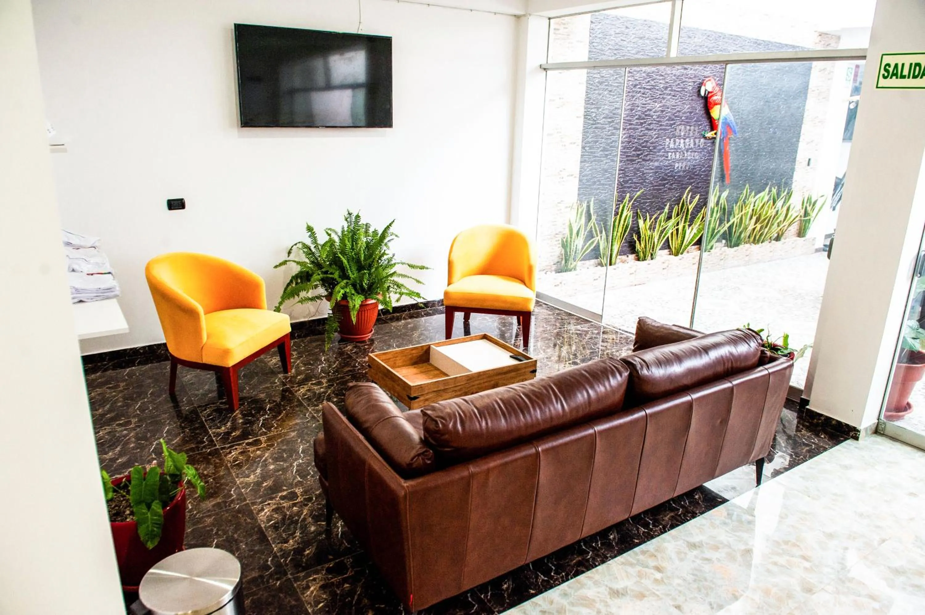 Communal lounge/ TV room in Hotel Boutique Papagayo