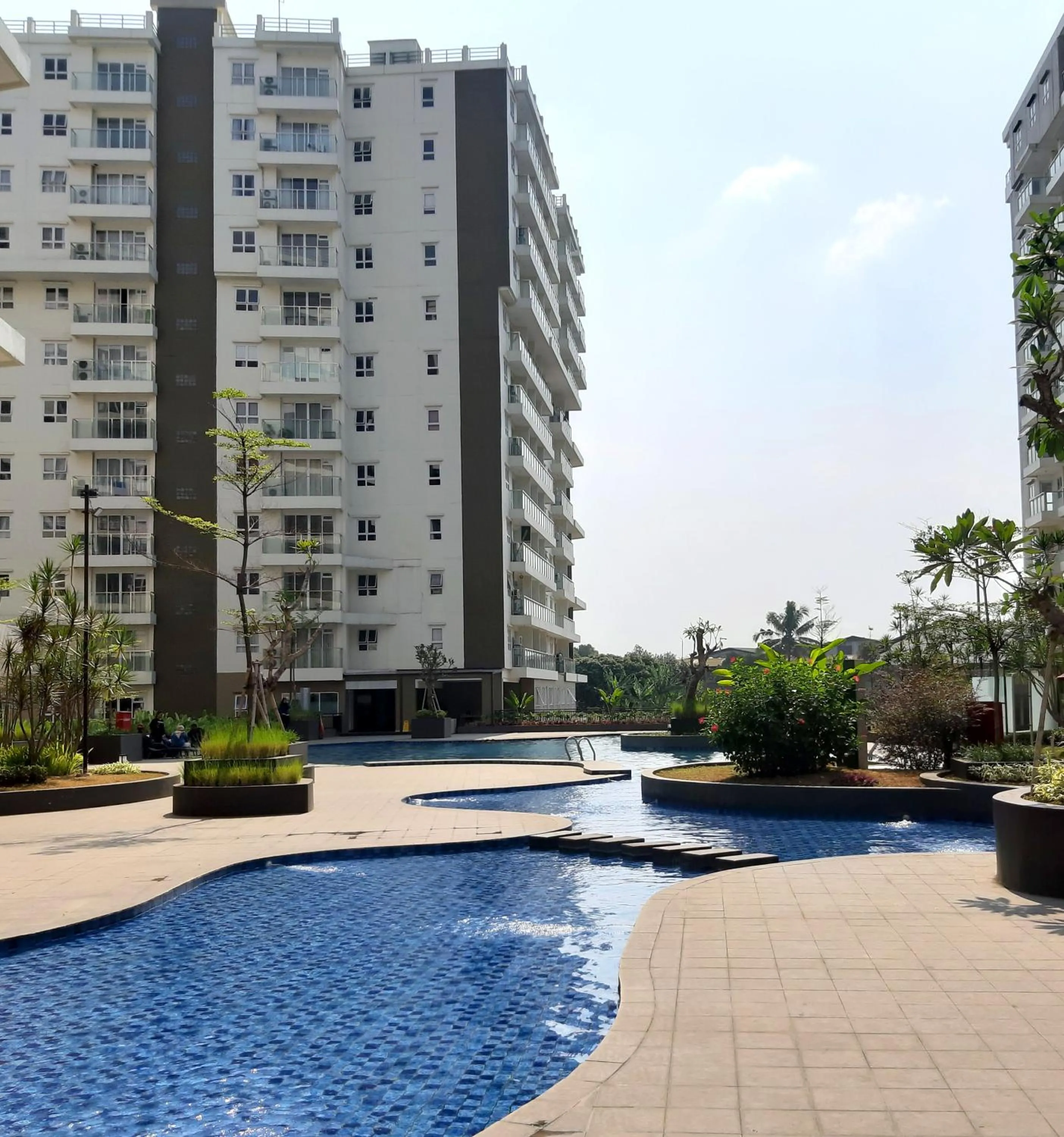 Swimming pool in High Livin Apartment Pasteur
