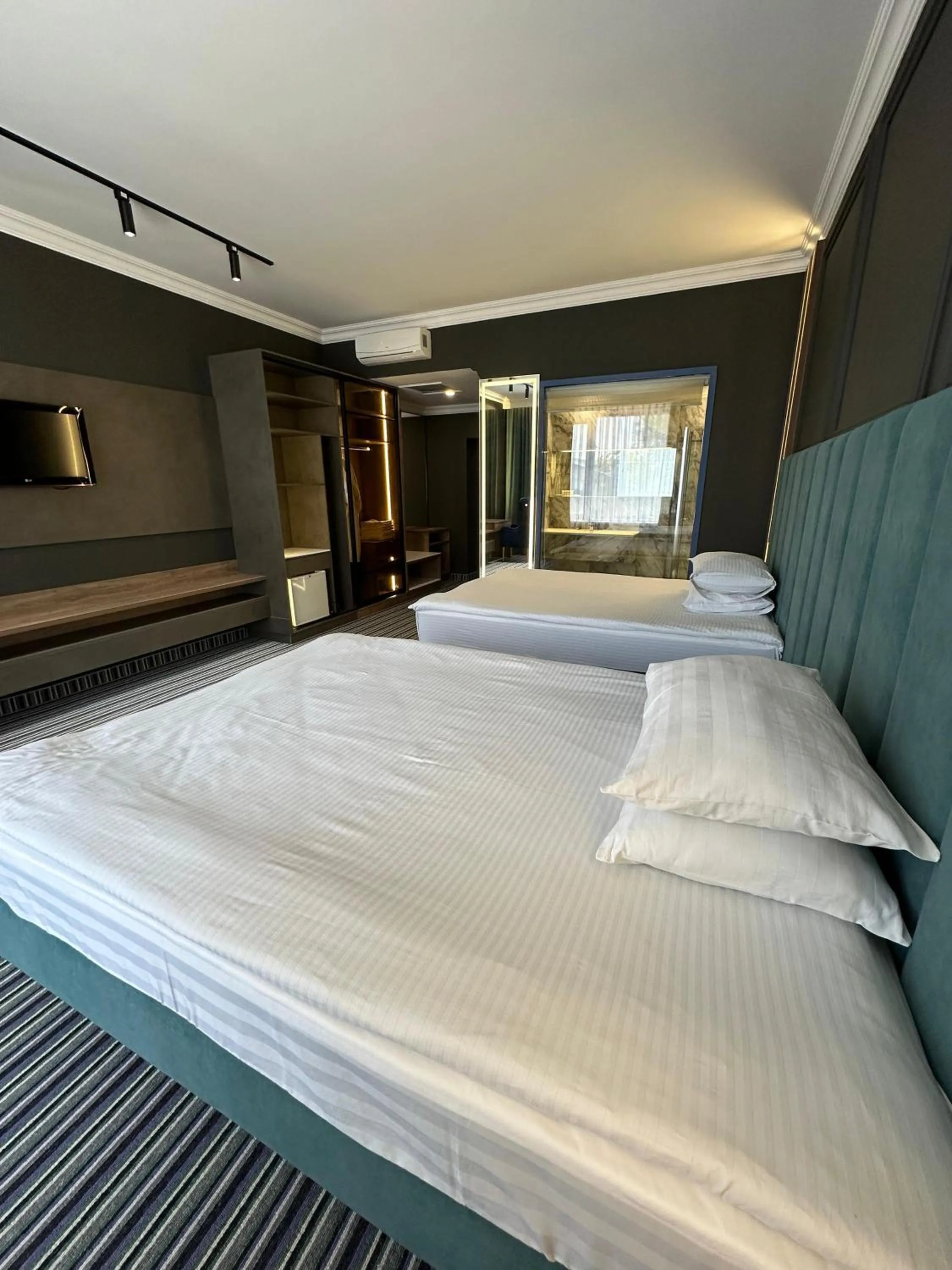 Bed in Sapar Standart Hotel