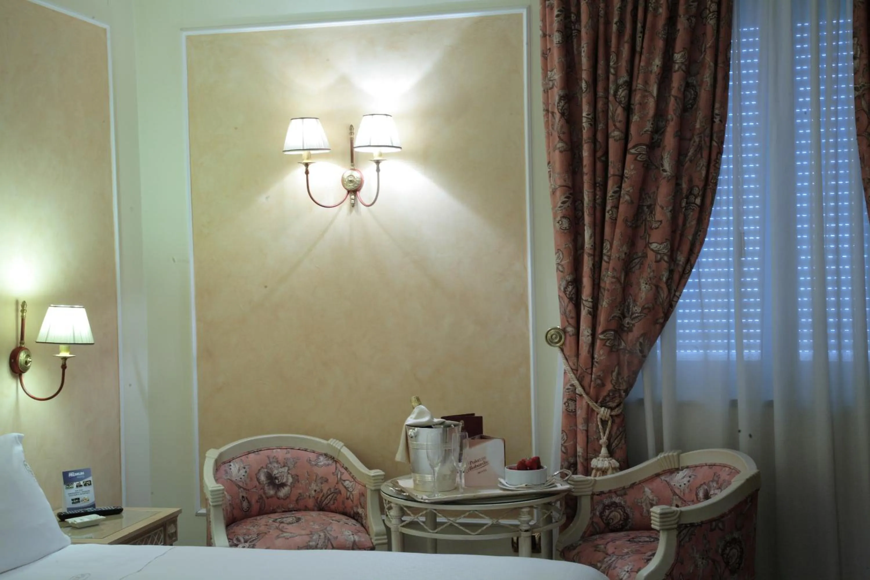 Seating area, Bed in Palazzo Alabardieri