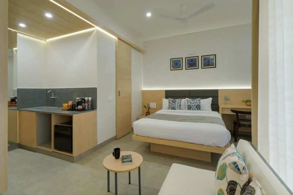 Kitchen or kitchenette, Bed in Iris Suites