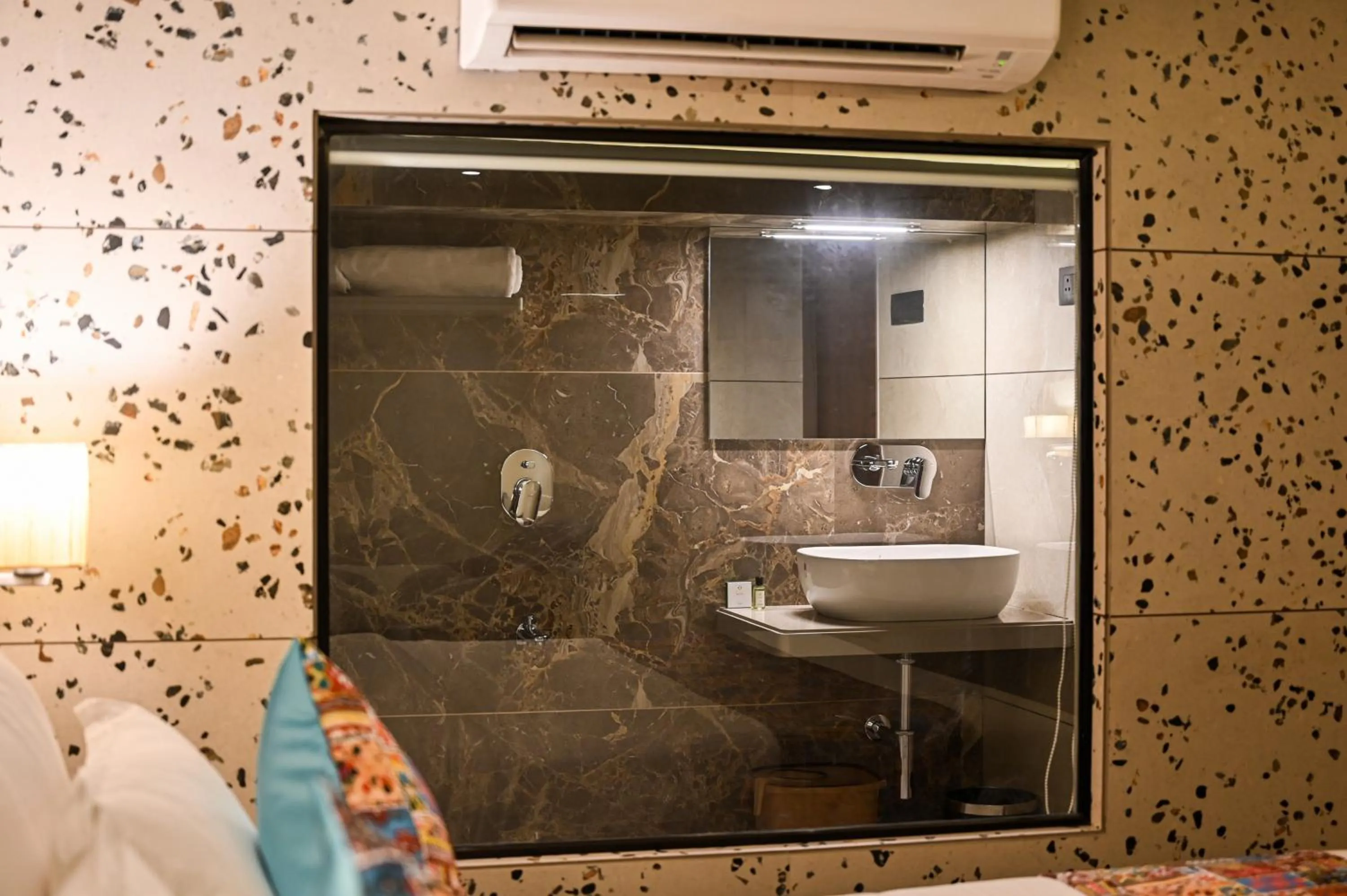 Bathroom in Suvidha Suites