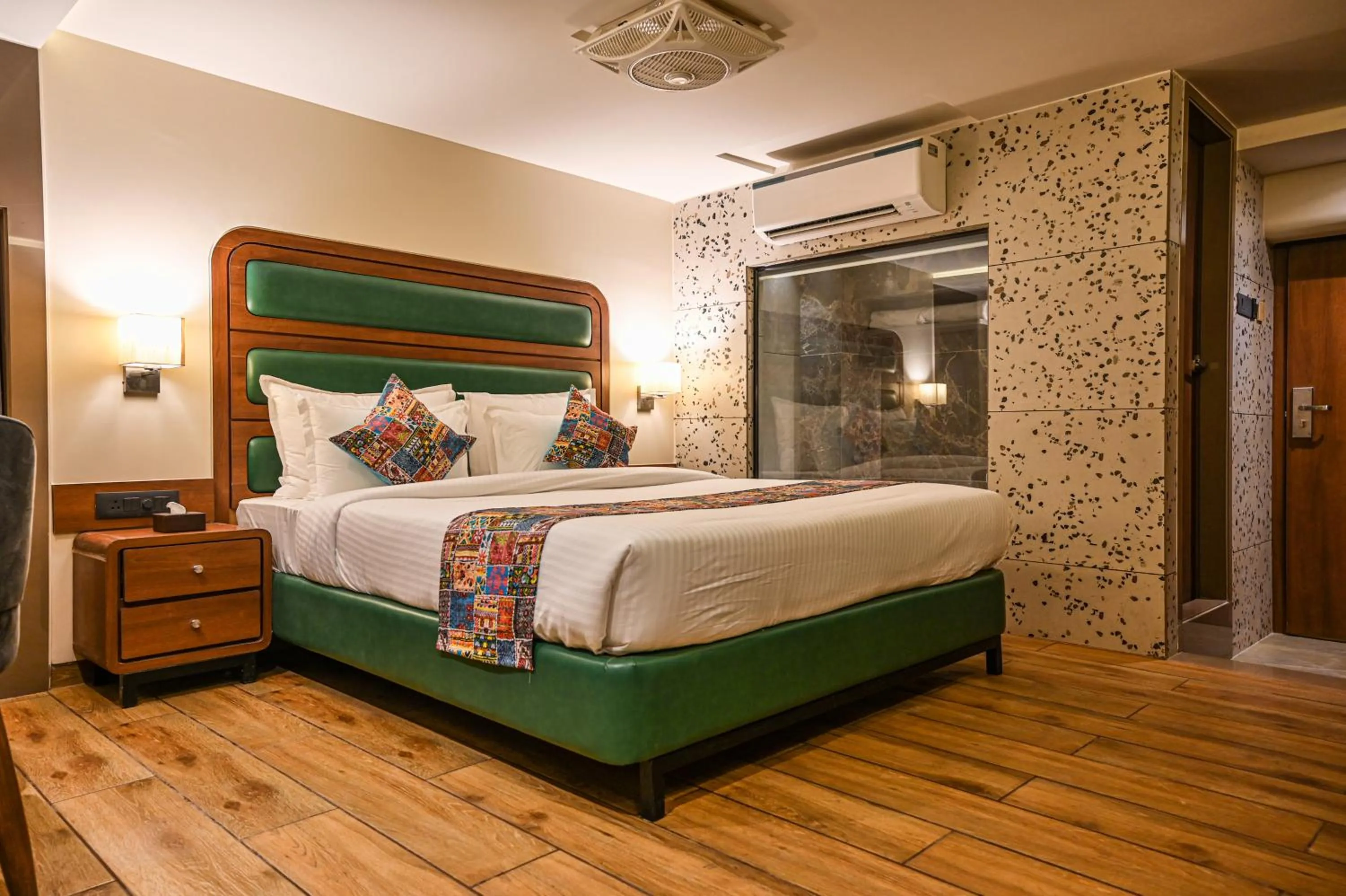 Photo of the whole room, Bed in Suvidha Suites