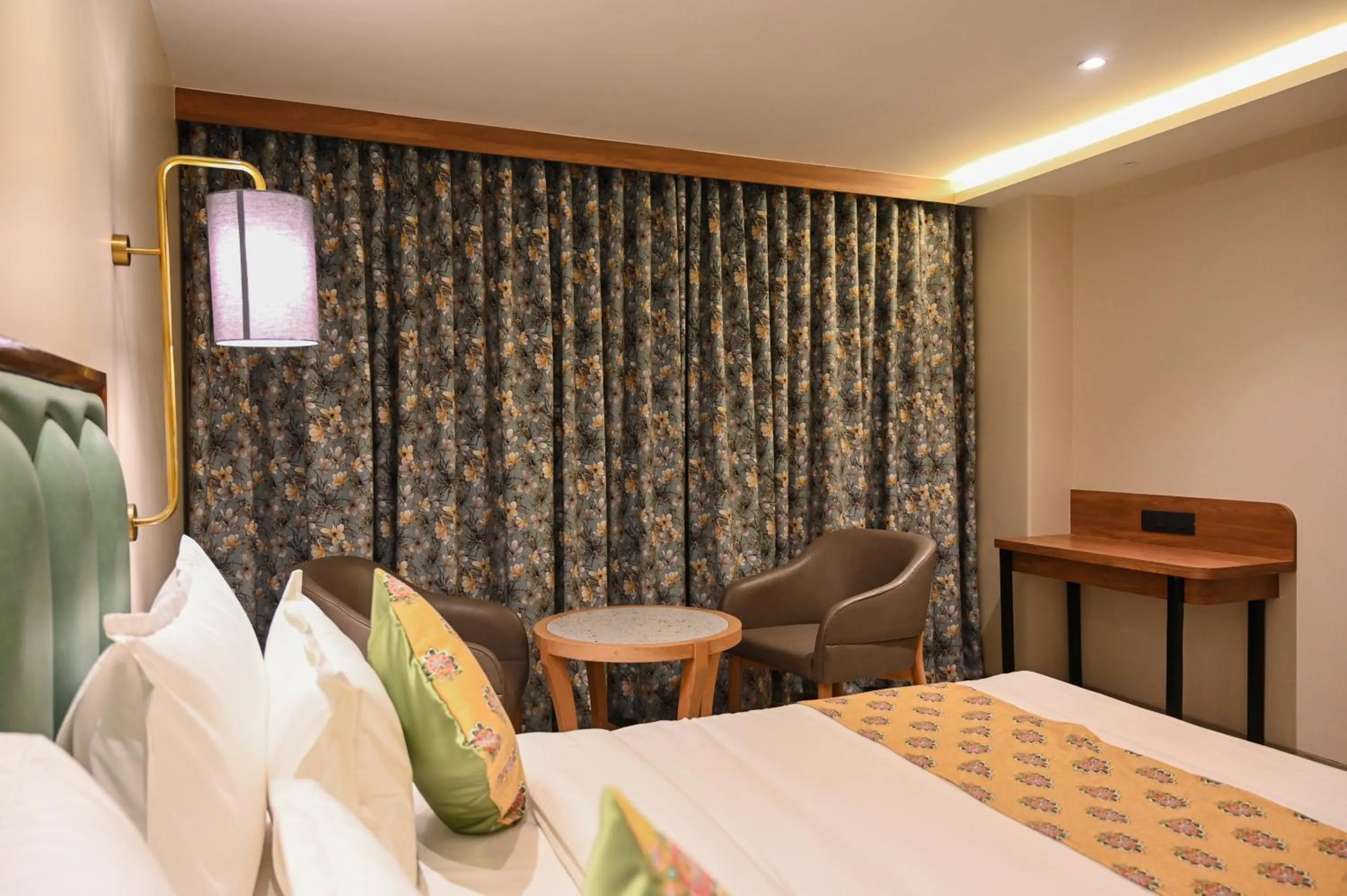 Photo of the whole room, Bed in Suvidha Suites