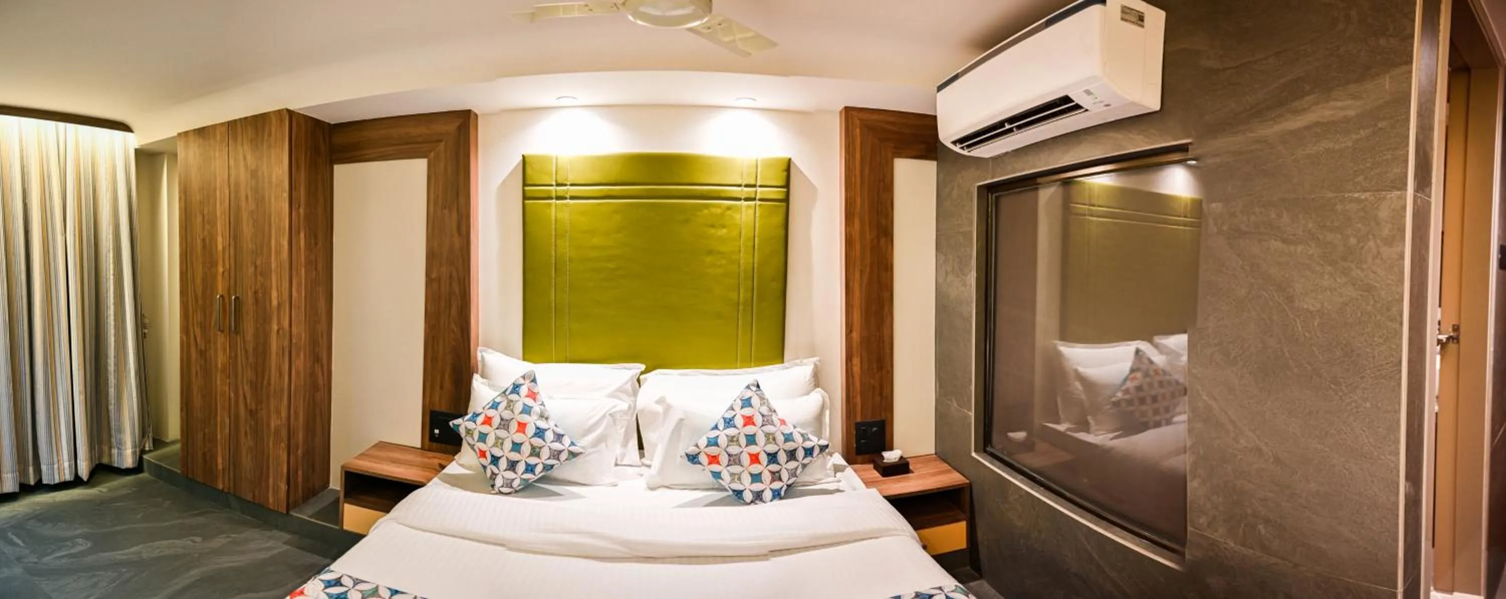 Photo of the whole room, Bed in Suvidha Suites